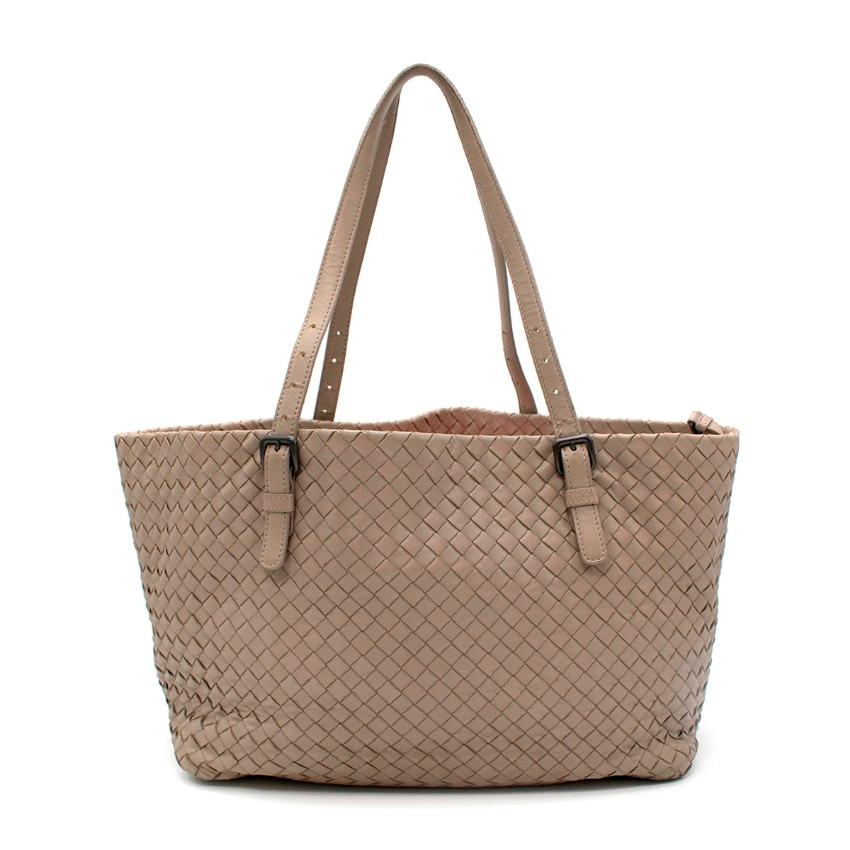  Bottega Veneta Taupe Intrecciato Leather Tote Bag
 

 - Timeless taupe-grey hued leather tote bag, featuring the iconic BV Intrecciato weave
 - 2 adjustable narrow leather handles with dark silver-tone buckles mean the bag can be carried as a tote,