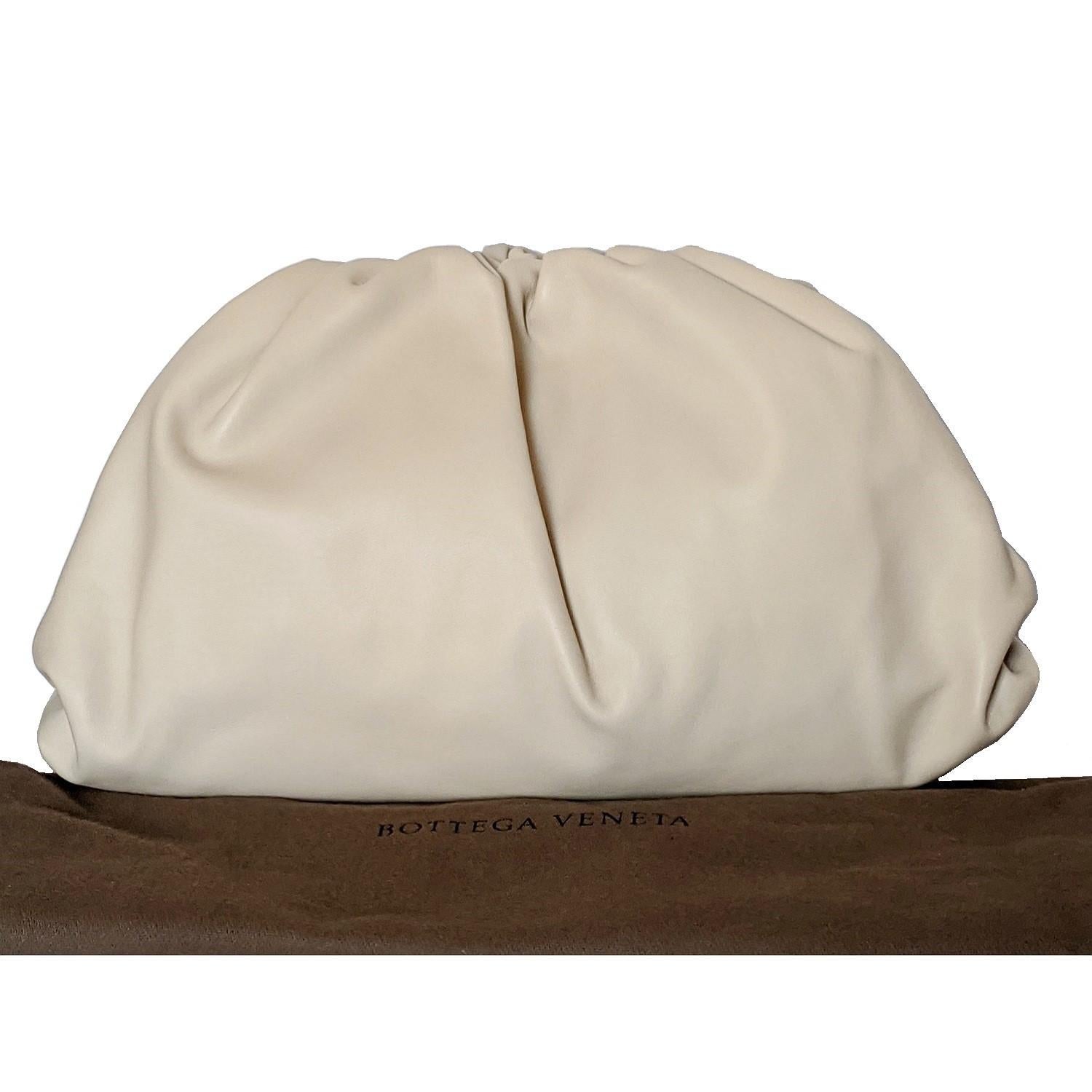 This Soft voluminous clutch with a magnetic frame covered in folds of Nappa leather is a must have to add to your collection. It's roomier than a traditional clutch, and its simplicity makes it a classic investment piece. Made in Italy. Retail price