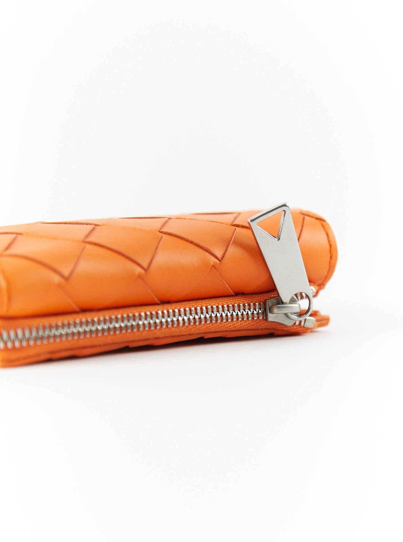 Women's or Men's BOTTEGA VENETA Tiny Intrecciato Tri-Fold Zip Wallet in Orange For Sale