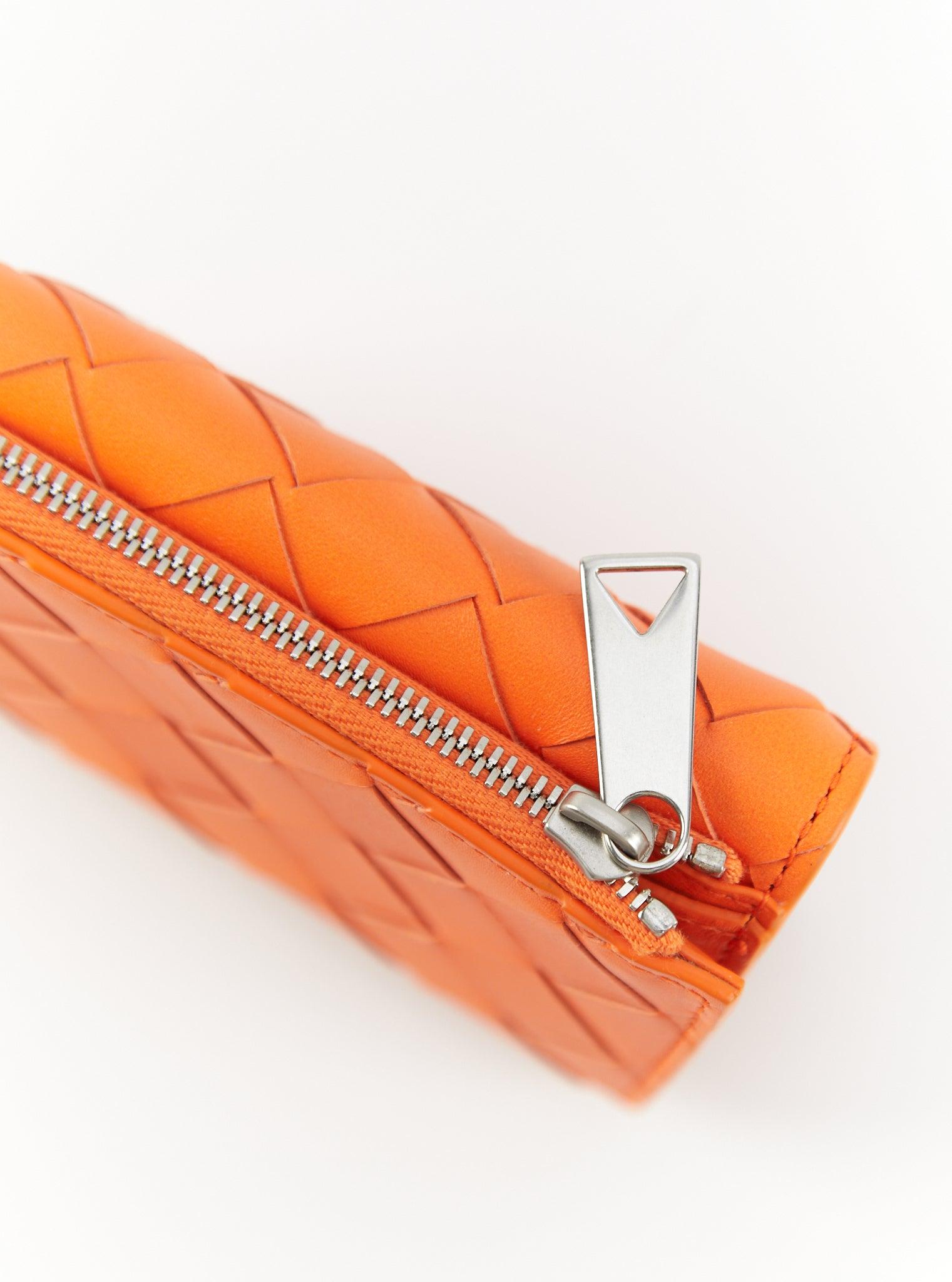 BOTTEGA VENETA Tiny Intrecciato Tri-Fold Zip Wallet in Orange For Sale 1