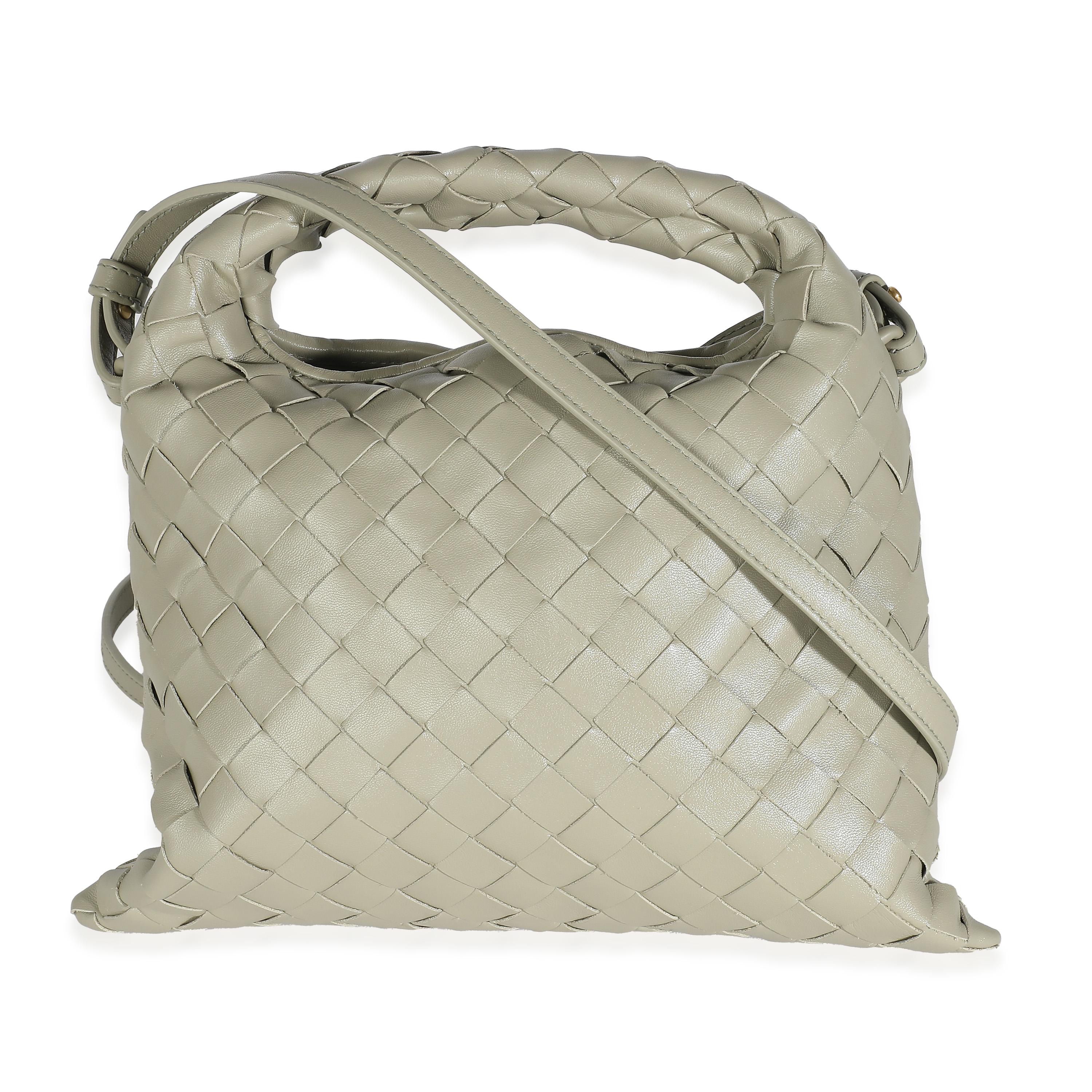 Listing Title: Bottega Veneta Travertine Nappa Intrecciato Mini Hop Hobo
SKU: 143144
MSRP: 3100.00 USD
Condition: Pre-owned 
Handbag Condition: Pristine
Condition Comments: Item has no indication of wear.  Final sale.
Brand: Bottega Veneta
Model: