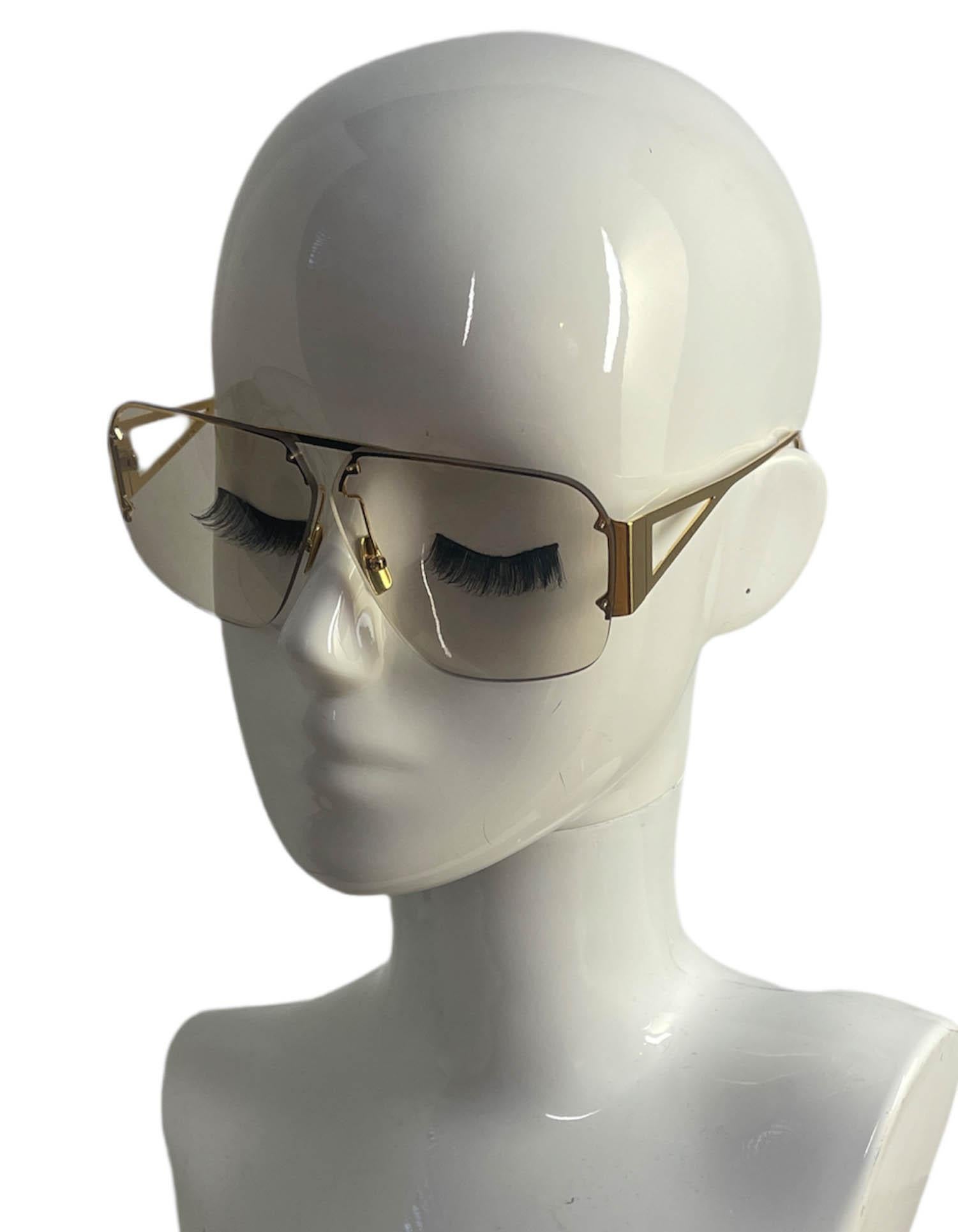 Bottega Veneta Unisex Gold Aviator-Style Sunglasses BV1065S

Made In: Italy
Color: Goldtone and light yellow
Hardware: Goldtone
Materials: Metal
Overall Condition: Like new
Estimated Retail: $485 plus tax
Includes: Bottega box and case, cleaning