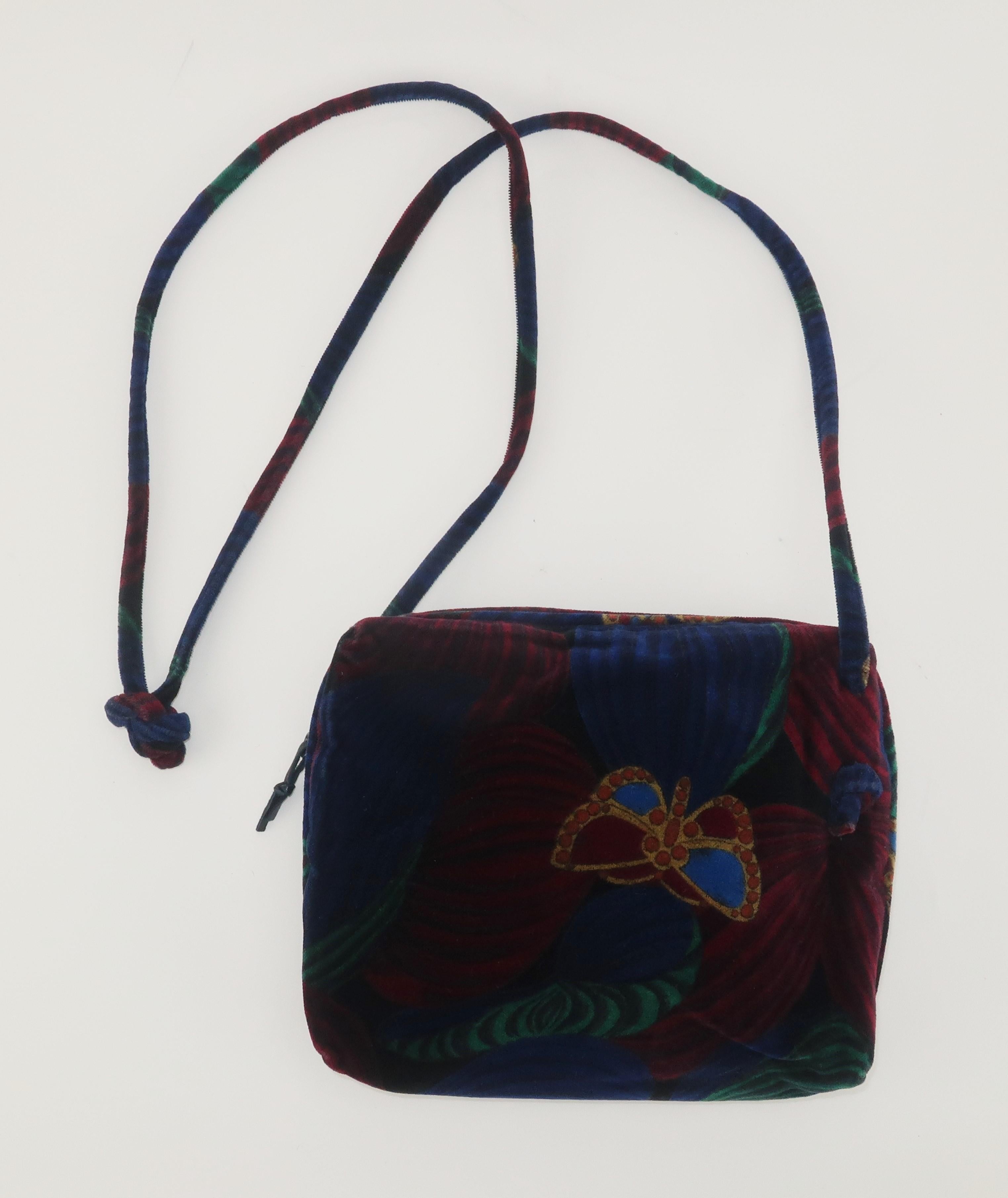 Bottega Veneta's slogan 'When your own initials are enough' is apropos as their handbags speak volumes about style and quality without the necessity of a logo ... and this 1970's velvet handbag is no exception. The rich velvet incorporates shades of
