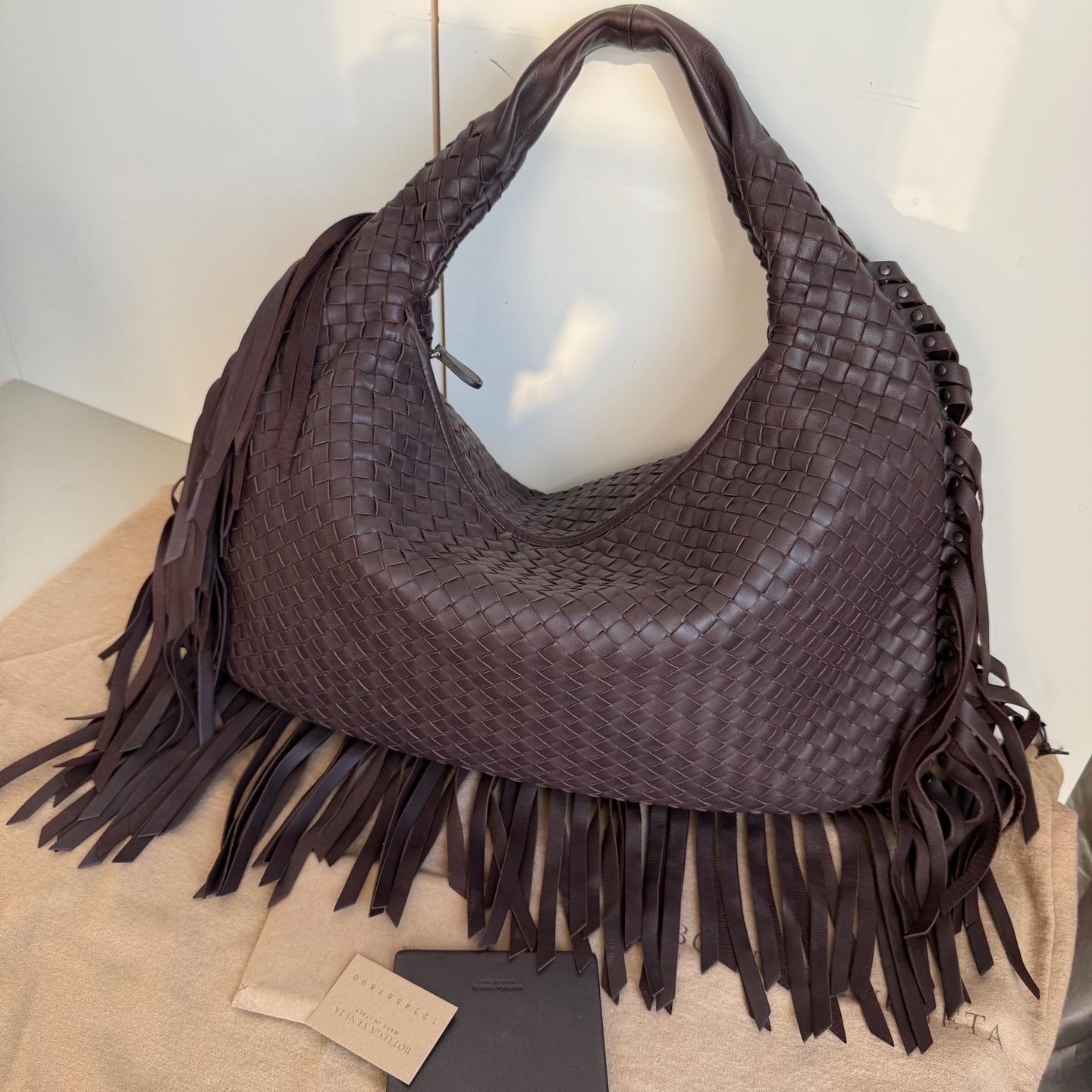 Bottega Veneta Veneta Fringed Hobo Large Black 47cm Lambskin Leather
 These are professional photos of the actual bag.
 This Bottega Veneta Veneta Bag is an exceptional piece of luxury, crafted from iconic lambskin leather with the instantly