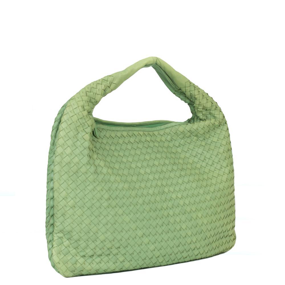 - Designer: BOTTEGA VENETA
- Model: Veneta
- Condition: Very good condition. Sign of wear on handles
- Accessories: Dustbag
- Measurements: Width: 44cm, Height: 30cm, Depth: 2cm
- Exterior Material: Leather
- Exterior Color: Green
- Interior