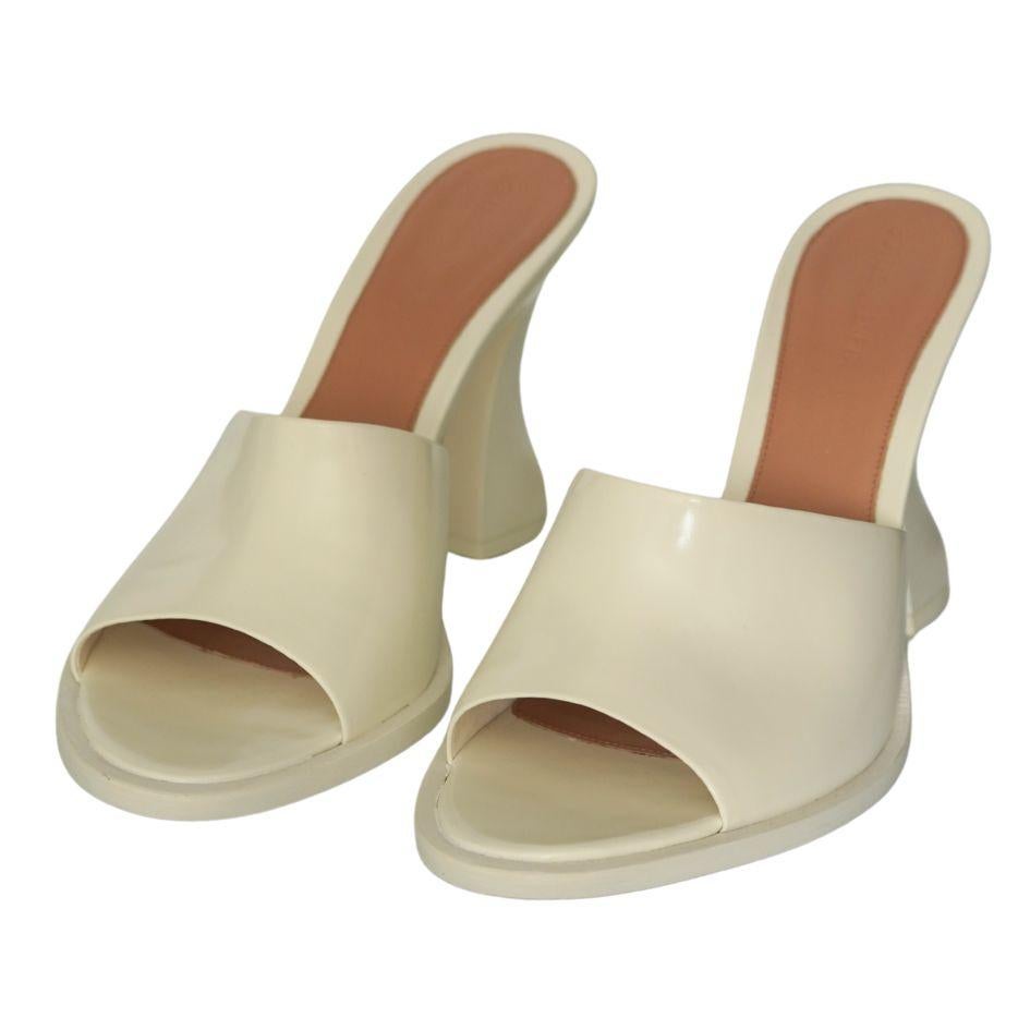 Bottega Veneta White Calfskin Cha Cha Heel Sandal 
Size 41
Perfect condition
Comes with box and dust bags
Off white color