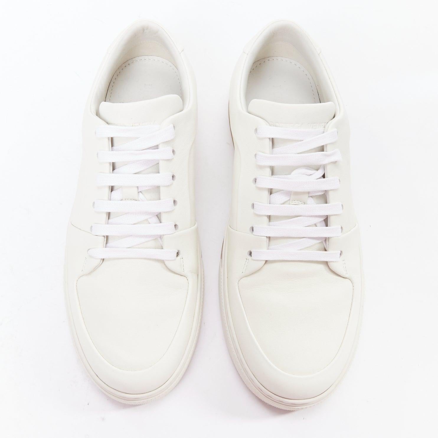 BOTTEGA VENETA white leather minimal lace up sneakers EU39
Reference: CNLE/A00357
Brand: Bottega Veneta
Designer: Daniel Lee
Material: Leather
Color: White
Pattern: Solid
Closure: Lace Up
Lining: White Leather
Extra Details: Pristine white sneakers