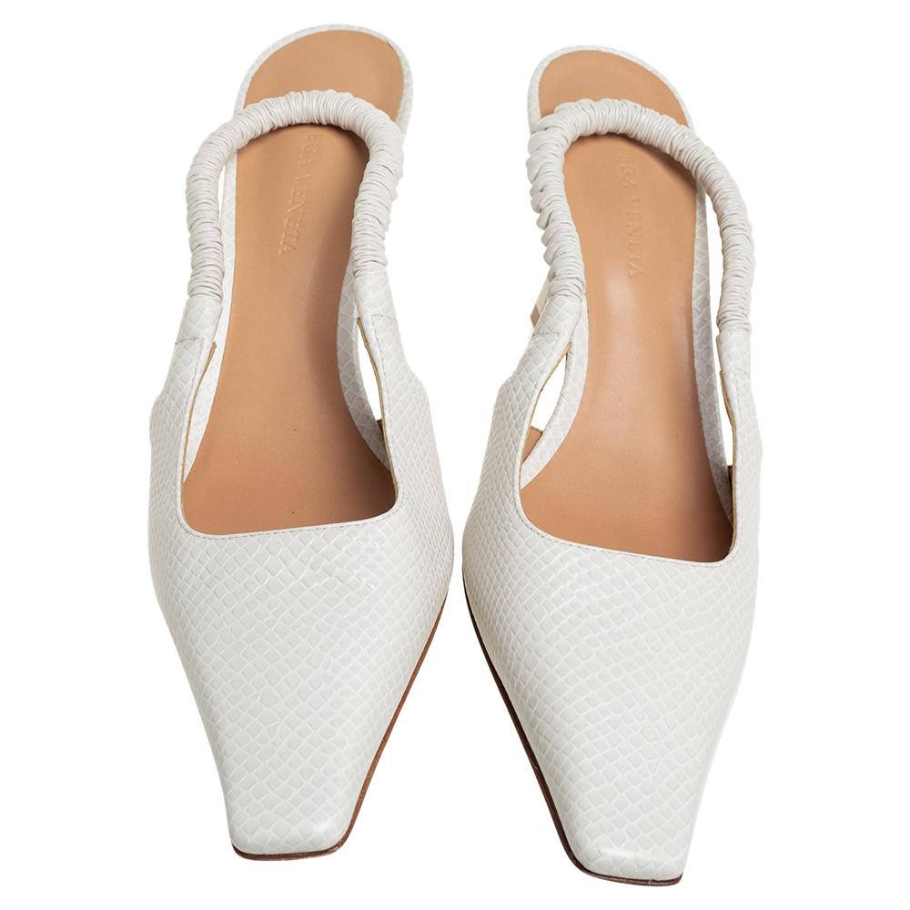 Made from textured leather, these white pumps are a splendid example of class. A pair of stunning Bottega Veneta pumps like this one is a closet must-have. These beauties feature elongated square toes, slingbacks, and 7 cm heels.

