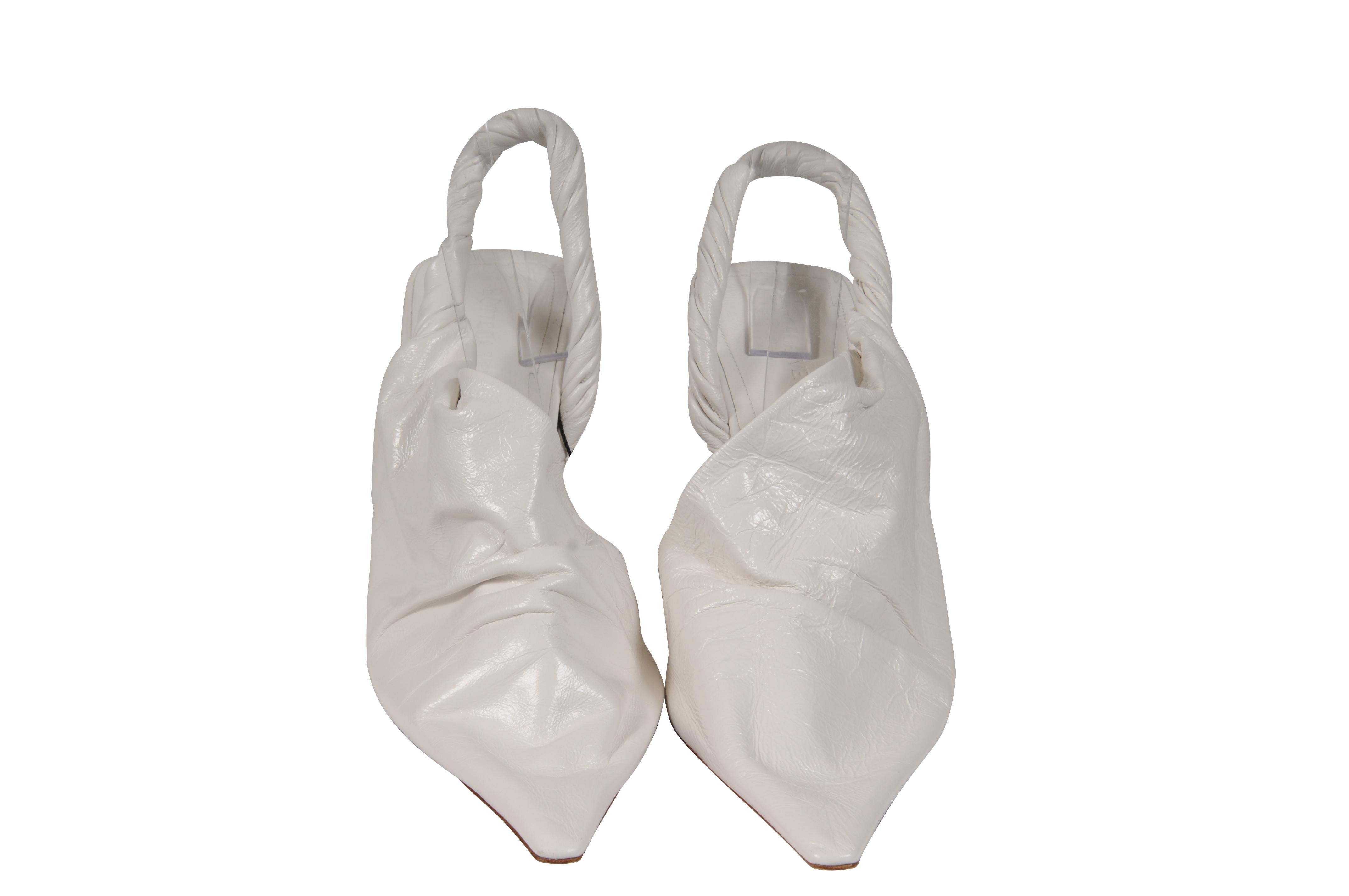 - White leather exterior

- Tagged size 39.5

- No box, comes with dustbag



Condition: 

The mules are brand new without box



Measurements: ( Approximately In Inches ) 

Insole: 11

Outsole: 11