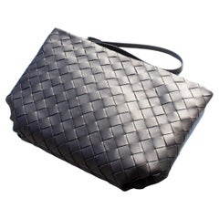 Bottega Veneta Y2K unisex black woven leather wristlet clutch bag