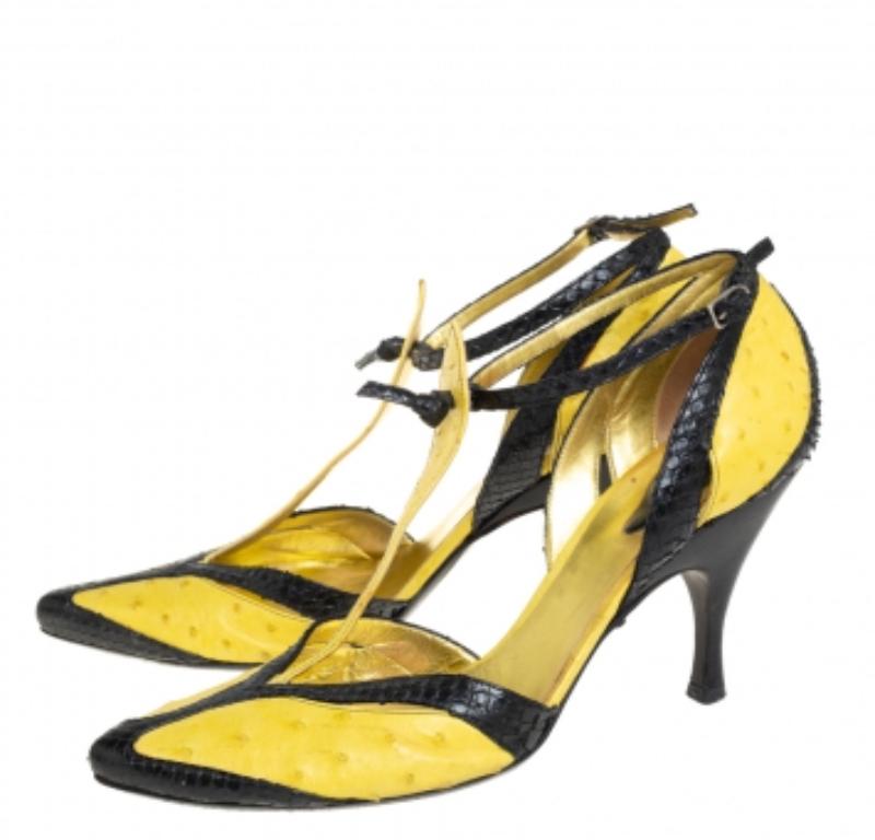 Crafted out of exotic ostrich and python skin, these pumps will add a luxe touch to your overall look. They feature covered toes, a T-strap design, high heels, and buckle ankle straps. This beautifully-crafted pair from Bottega Veneta will make a