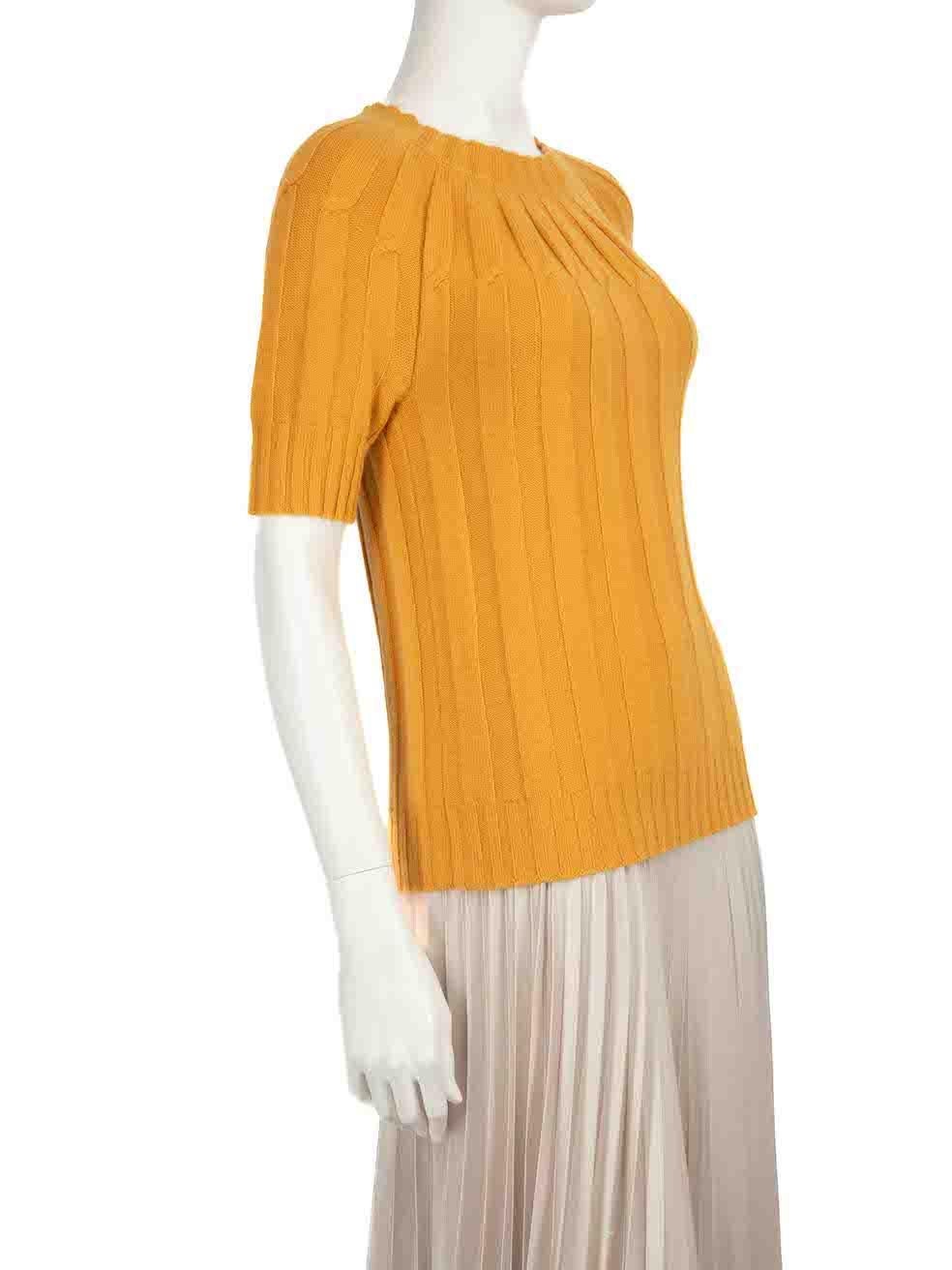 CONDITION is Very good. Hardly any visible wear to jumper is evident on this used Bottega Veneta designer resale item.
 
 
 
 Details
 
 
 Yellow
 
 Cashmere
 
 Cable knit top
 
 Short sleeves
 
 Round neck
 
 
 
 
 
 Made in Italy
 
 
 
