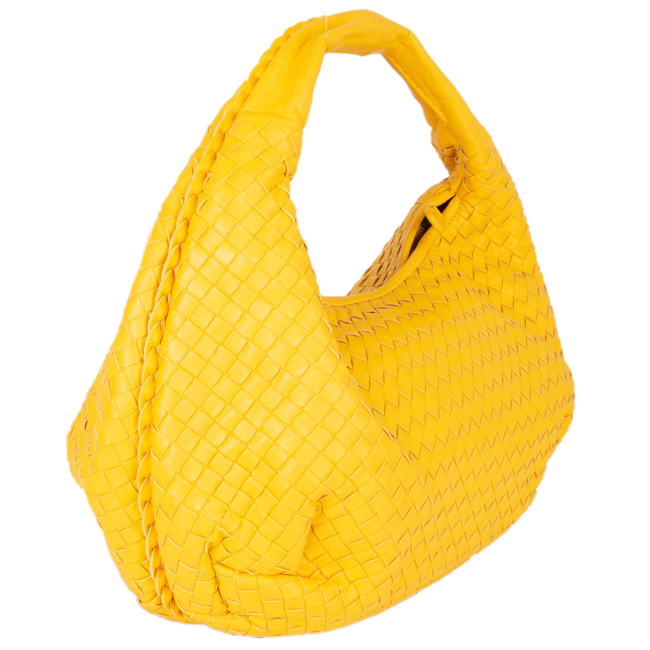 Bottega Veneta 'Belly Veneta Medium' hobo handbag in yellow inrtecciato nappa leather. Have been carried once and is in virtually new condition. Comes with pocket mirror.

Height 28cm (10.9in)
Width 44cm (17.2in)
Depth 7cm (2.7in)
Drop of the Handle