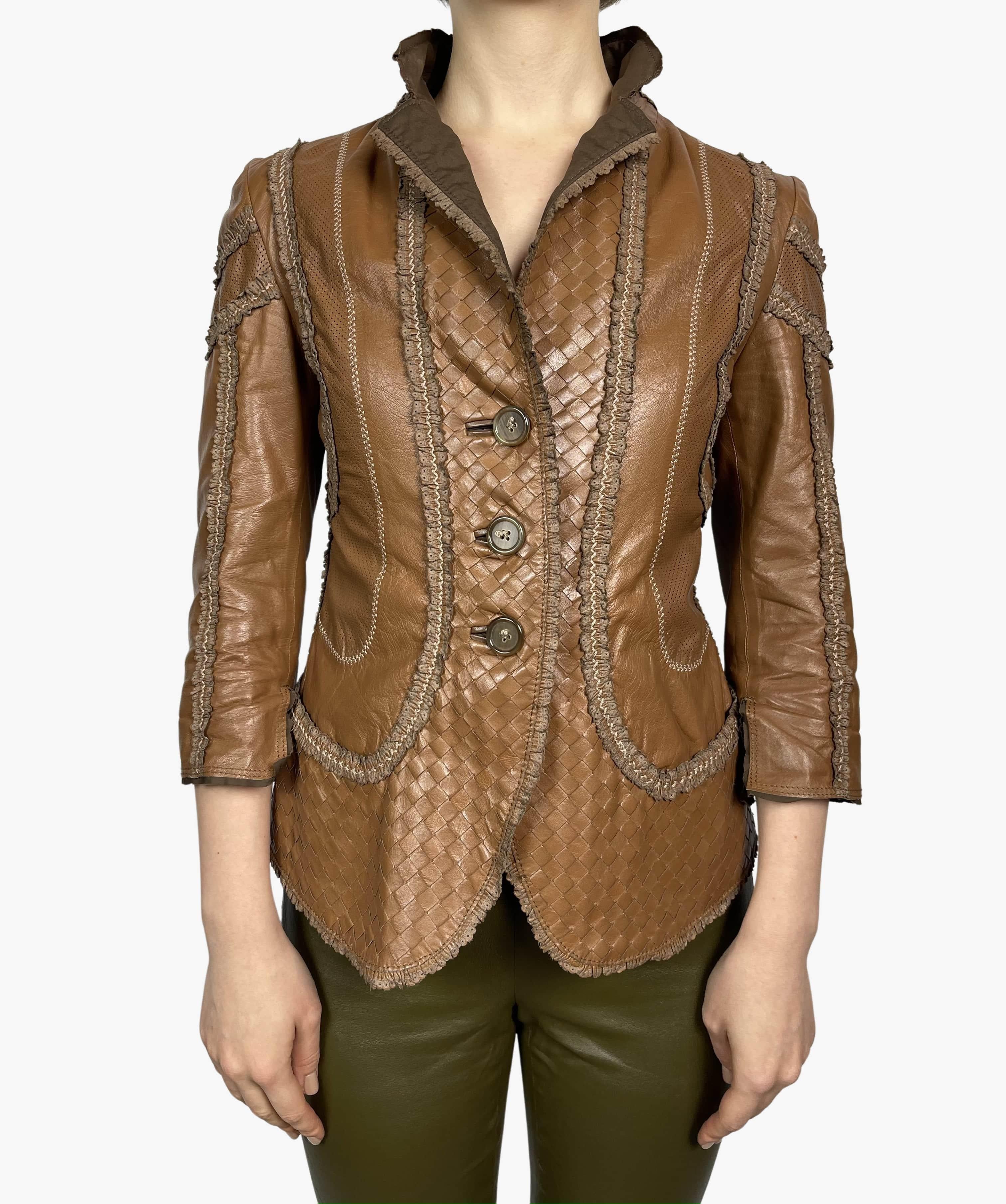Bottega Venetta runway leather blazer in tobacco-brown color by Tomas Maier. Embellished with decorative leather elements. 
Season: Spring-Summer 2006 
Composition: 100% leather 
Condition: Good. Some signs of wear at exterior and interior. 
Size: S