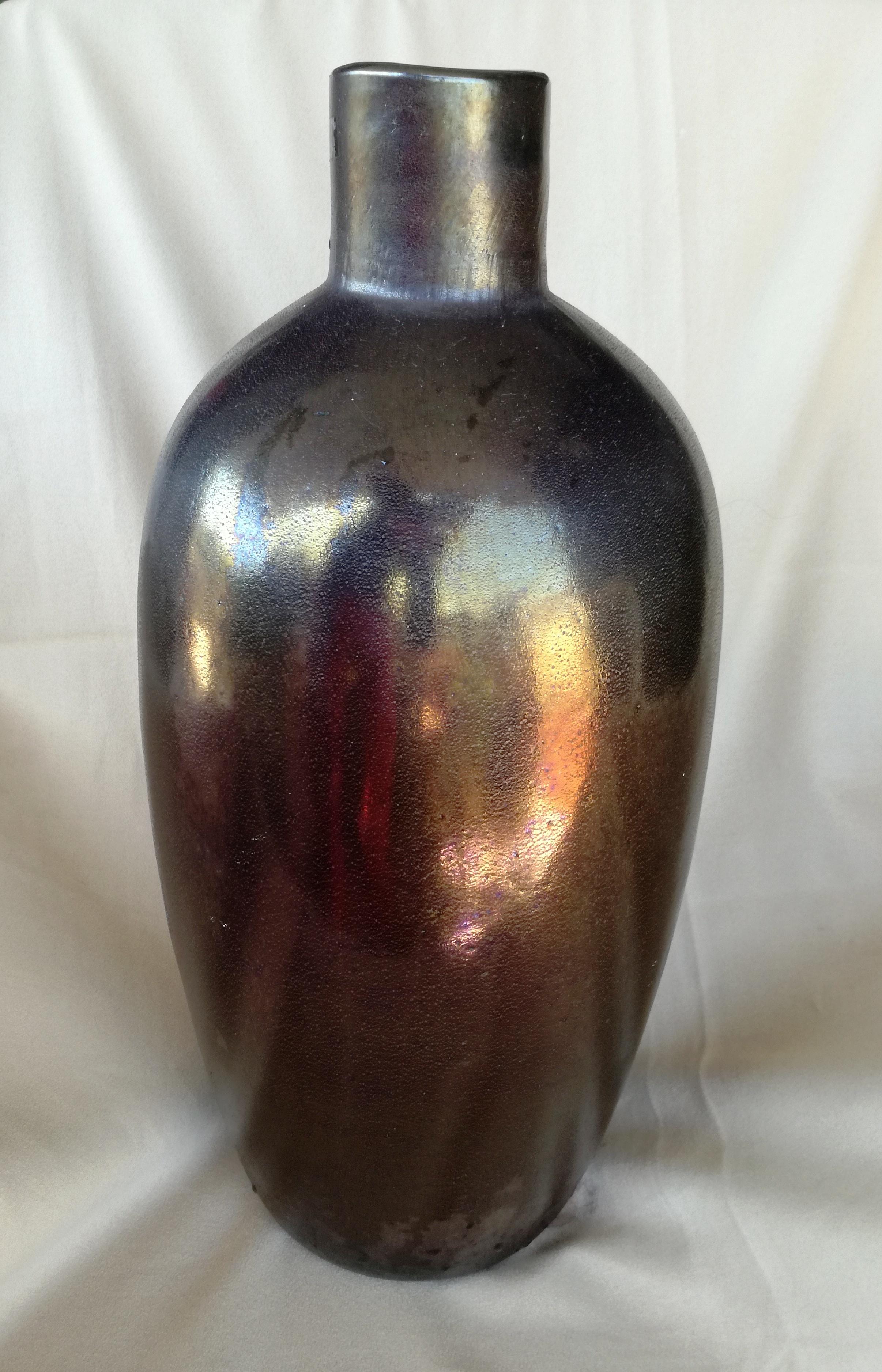 1 bottle 1990s, Barbini Murano. large bottle/vase, Murano glass, silicon-treated. bottle is heavy solid glass. silicon treatment is on the surface. in the bottom you can see the chromatic overlay processing of oxides to get the brown/bordeaux color