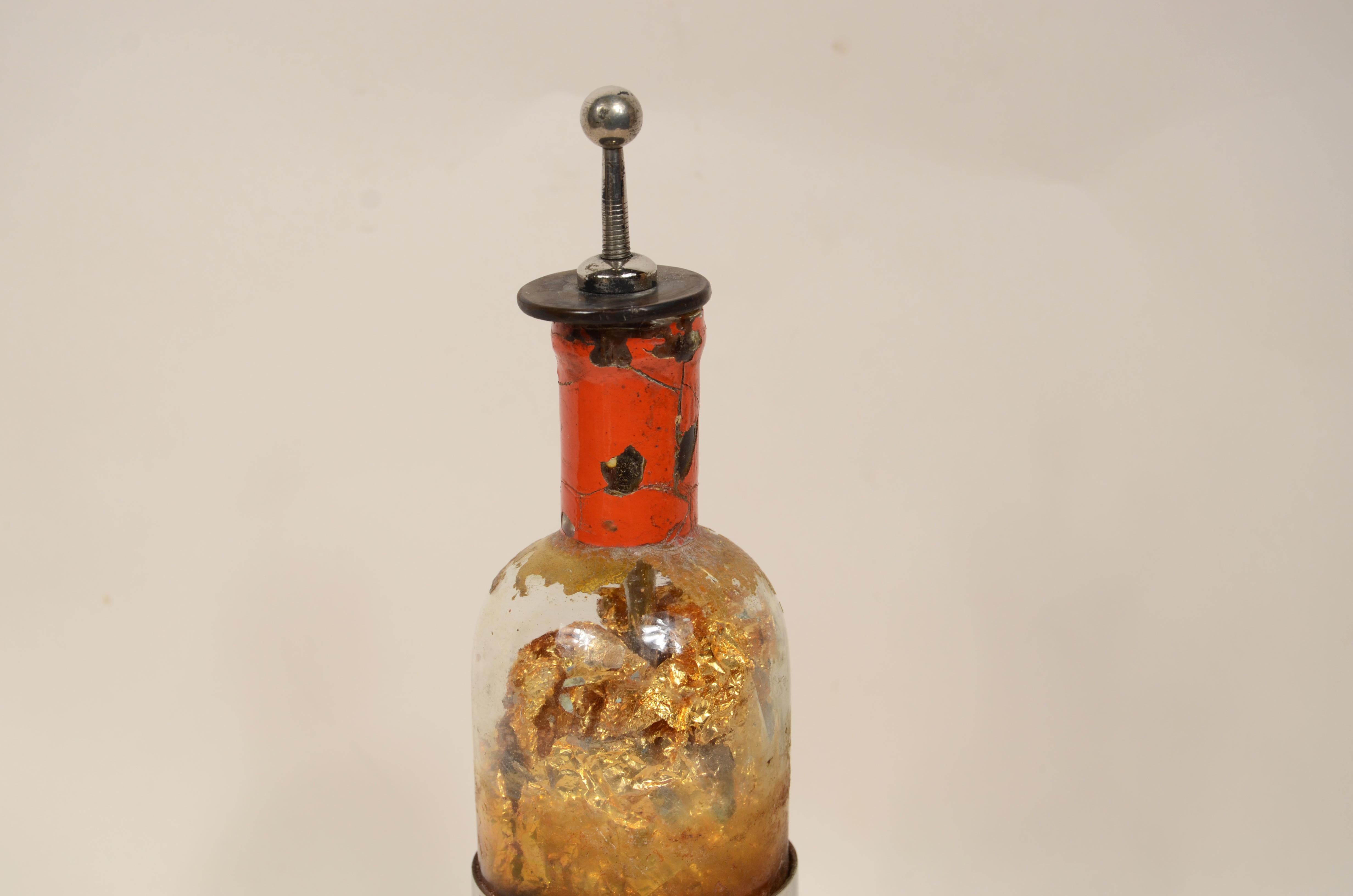 Leiden bottle from the second half of the 19th century  is about  an electrical component that accumulates and stores a high-voltage electrical charge by means of an external source  for example, an electrostatic generator. Generally made from a