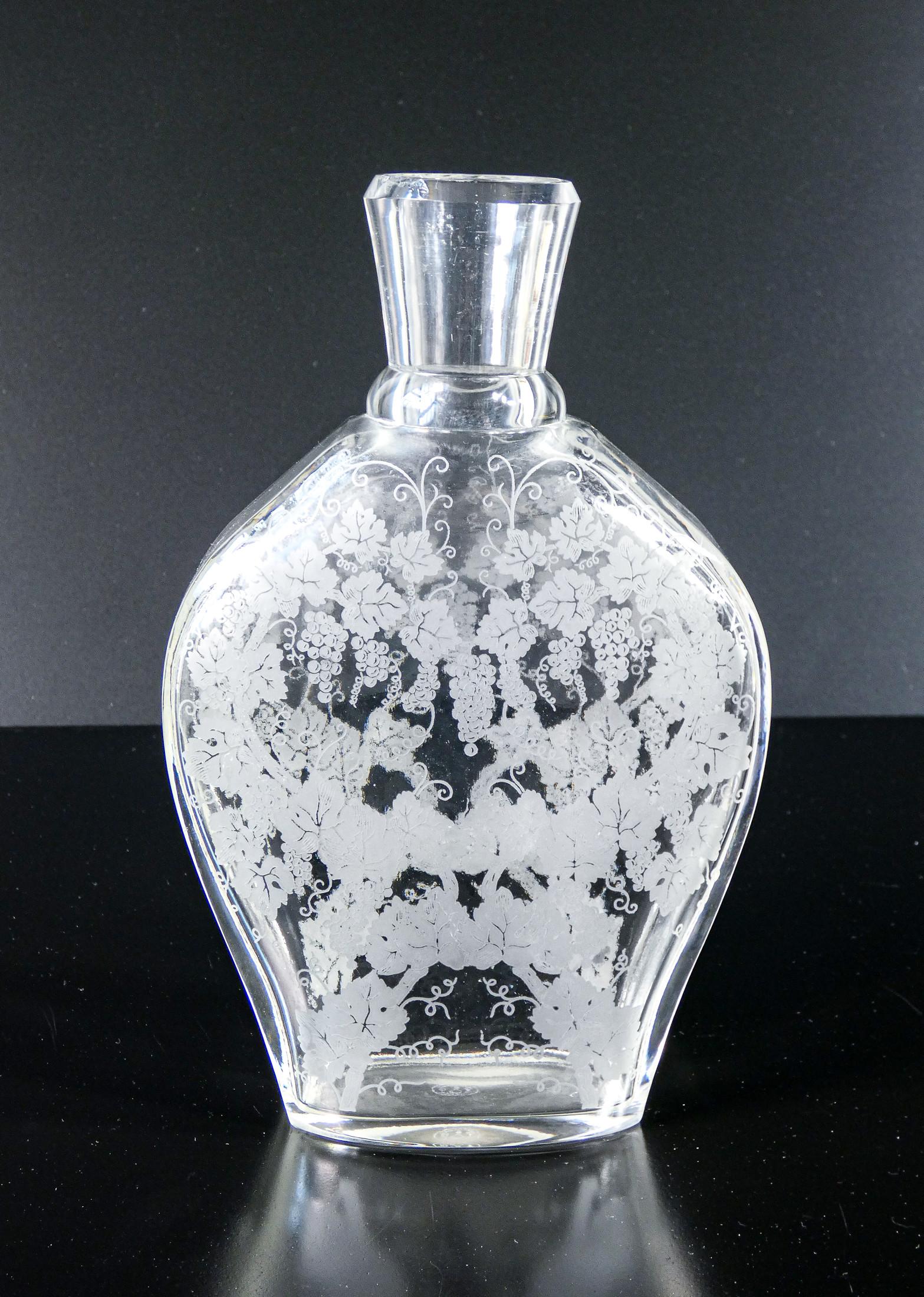 Mid-20th Century BACCARAT crystal bottle, motif depicting a vine and bunches of grapes For Sale