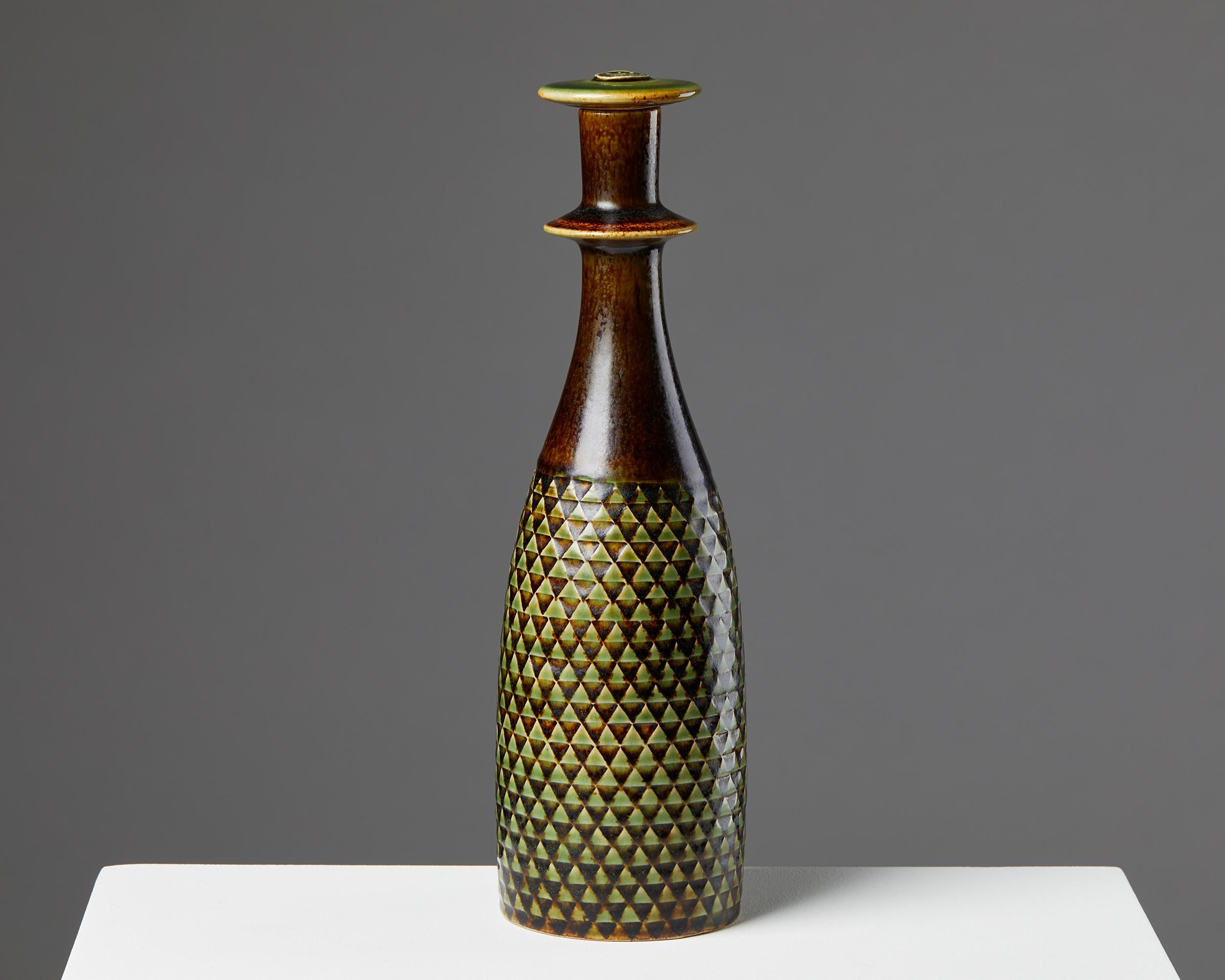 Bottle designed by Stig Lindberg for Gustavsbergs,
Sweden. 1950s.
Stoneware.

Signed.

Measures: H: 30 cm / 11 3/4