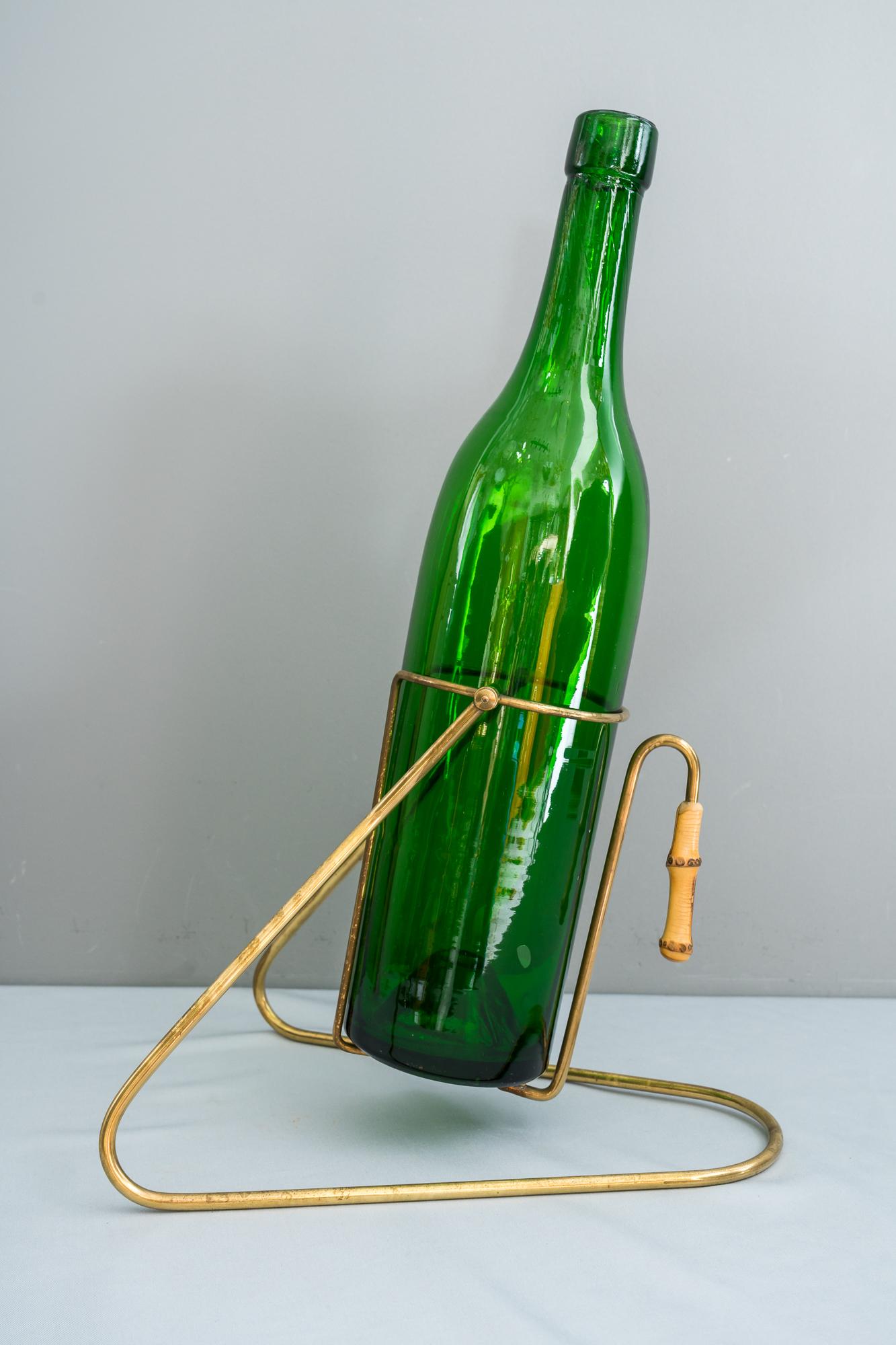 Bottle holder for big 3 liter wine bottles, Vienna, 1950s
Brass and bamboo combination
Rare model
Attributed to Auböck
Original condition
The bottle is only for the photoshooting it is not included.
The hole for the bottle is: 11.5cm.