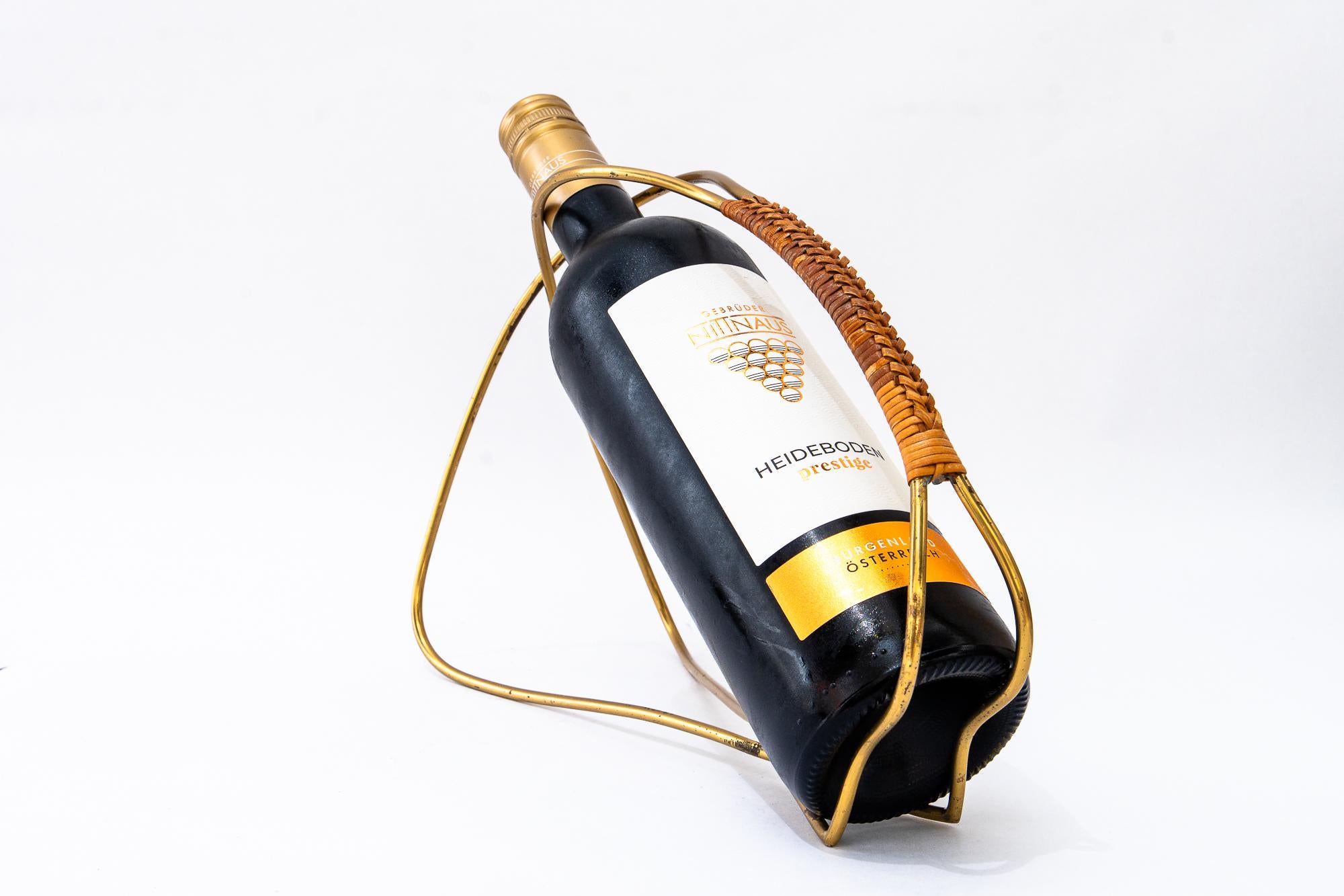 Messing und Korbweide
Ursprünglicher Zustand
(Die Flasche ist nur für das Foto-Shooting und nicht enthalten).