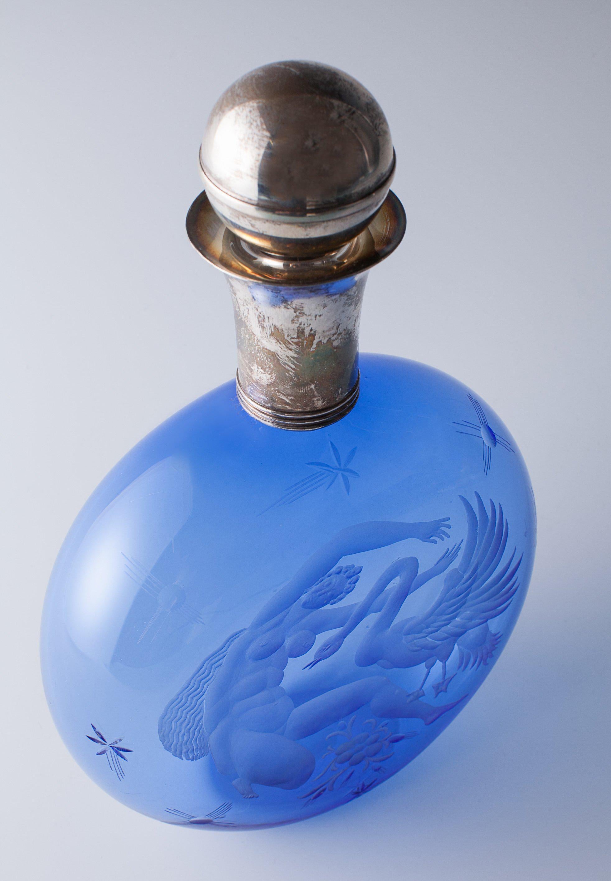 Guido Balsamo Stella. Bottle 'Leda and the swan' for S.A.L.I.R. Murano.
Date: circa 1940.
Condition: Very good.
Height (cm): 27.5.
Signed and silver stamped.
