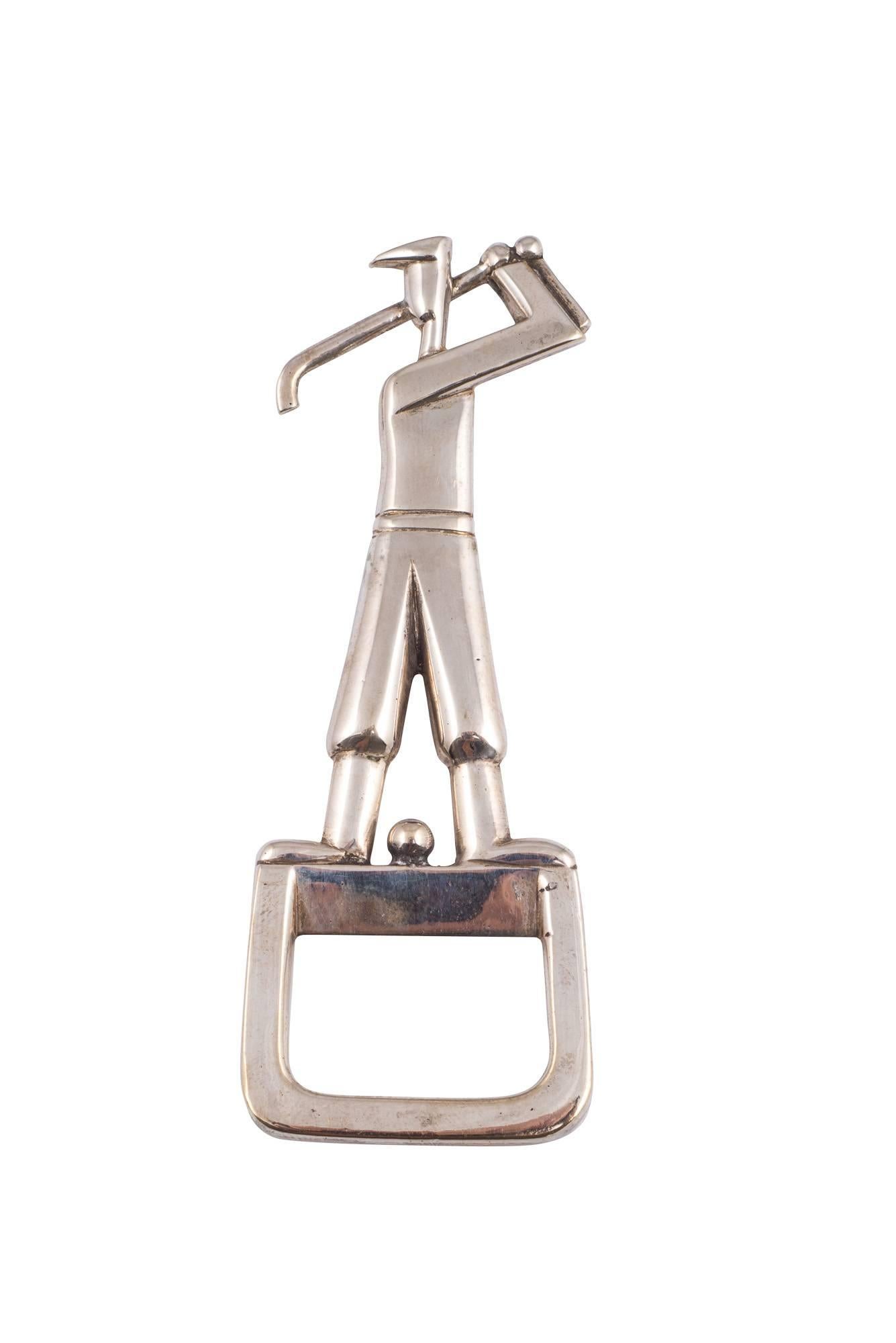 Bottle-opener and cork-screws are a well-liked and international field of collecting. Especially asked for are the depictions of sportsmen and -women. In our case it is a golfer. The bottle opener is in a very good, unused condition and is marked