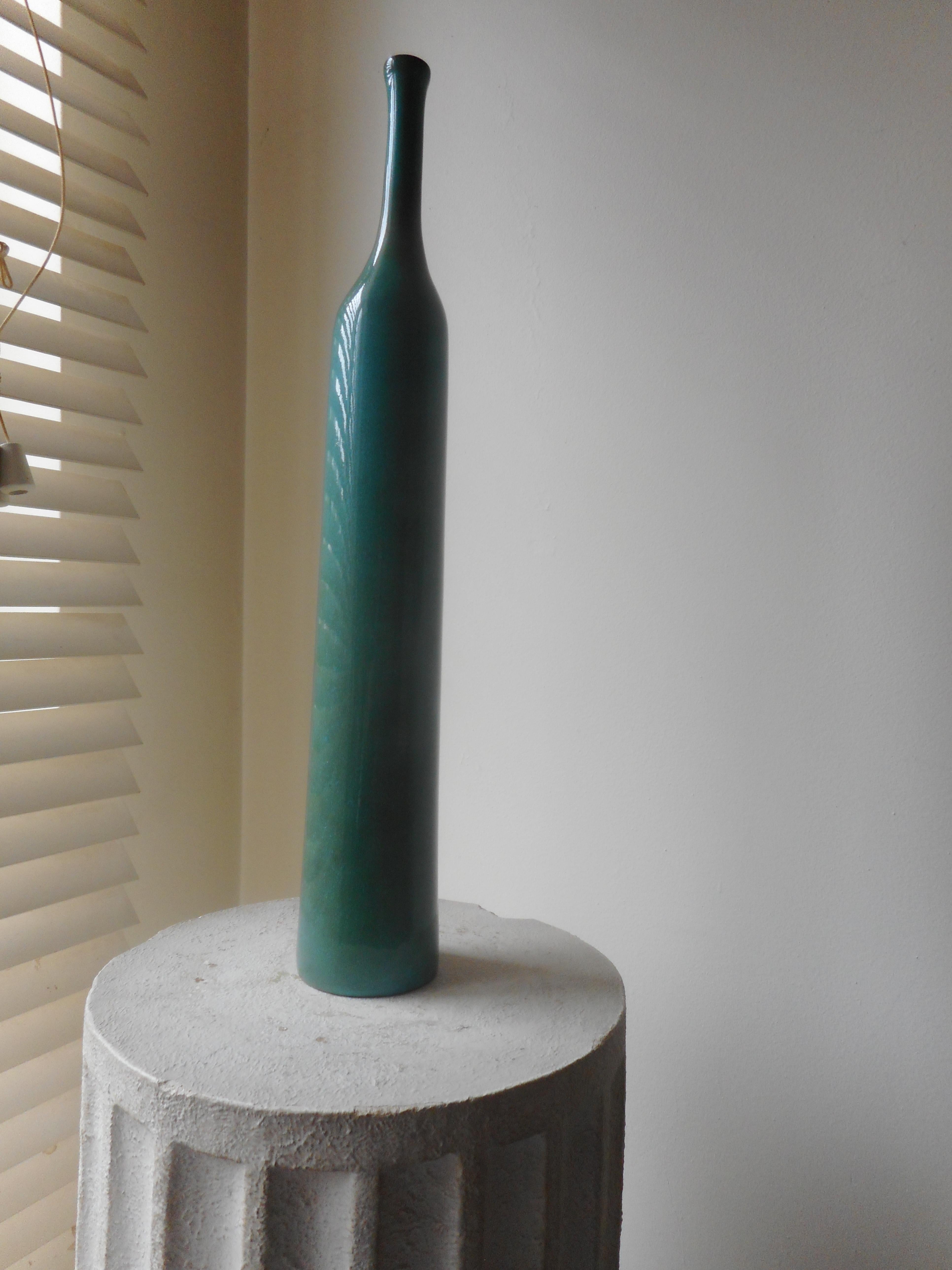 Big celadon green bottle-shaped vase by artists Jacques and Dani Ruelland.
Signed on the base.
France, Circa 1960.