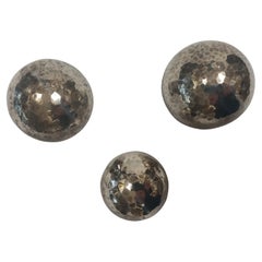 Bottle stoppers with hammered decoration in the style of Josef Hoffmann