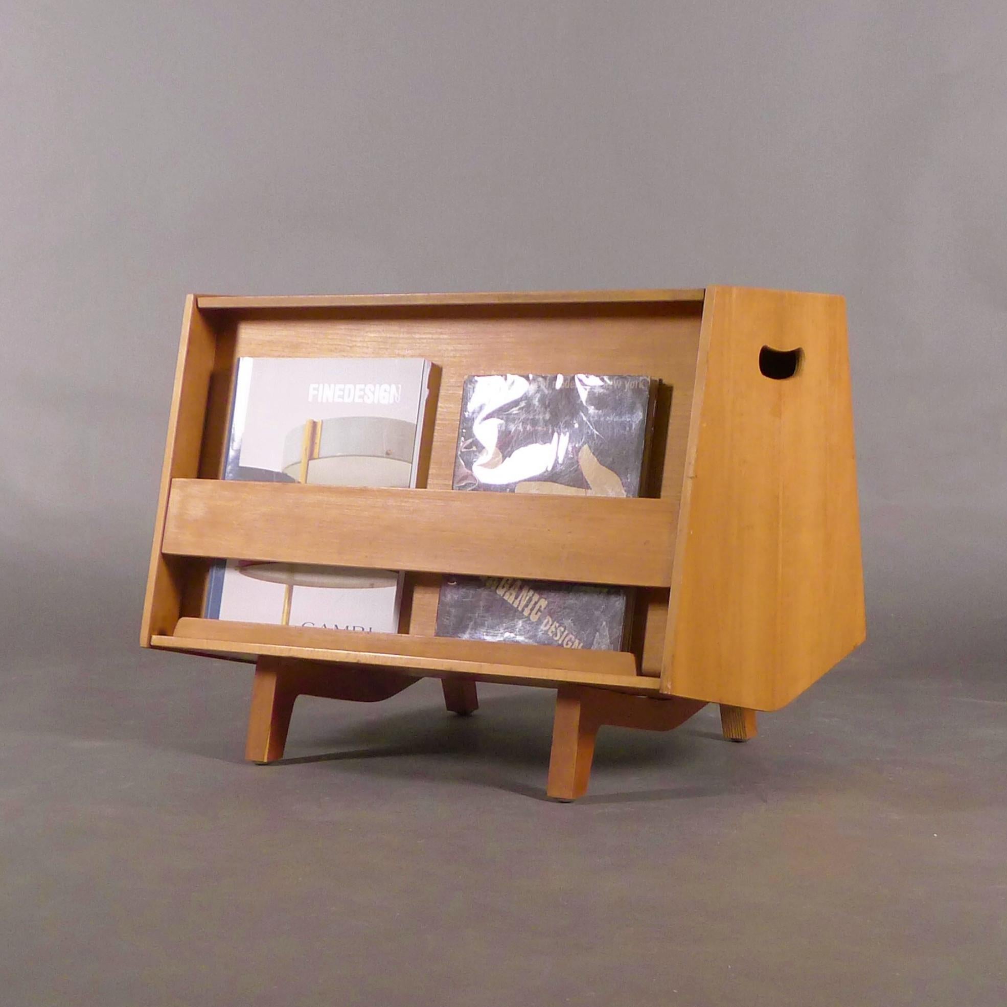 This iconic 1960s mini bar / bookcase / side table was designed by Ernest Race in 1963 at the invitation of Isokon's founder Jack Pritchard to redesign the original bottleship by Egon Riss.  The Bottleship Mark II was produced by Isokon in limited