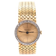 Bouche Girod Montre vintage en or jaune 18 carats avec diamants pour femmes