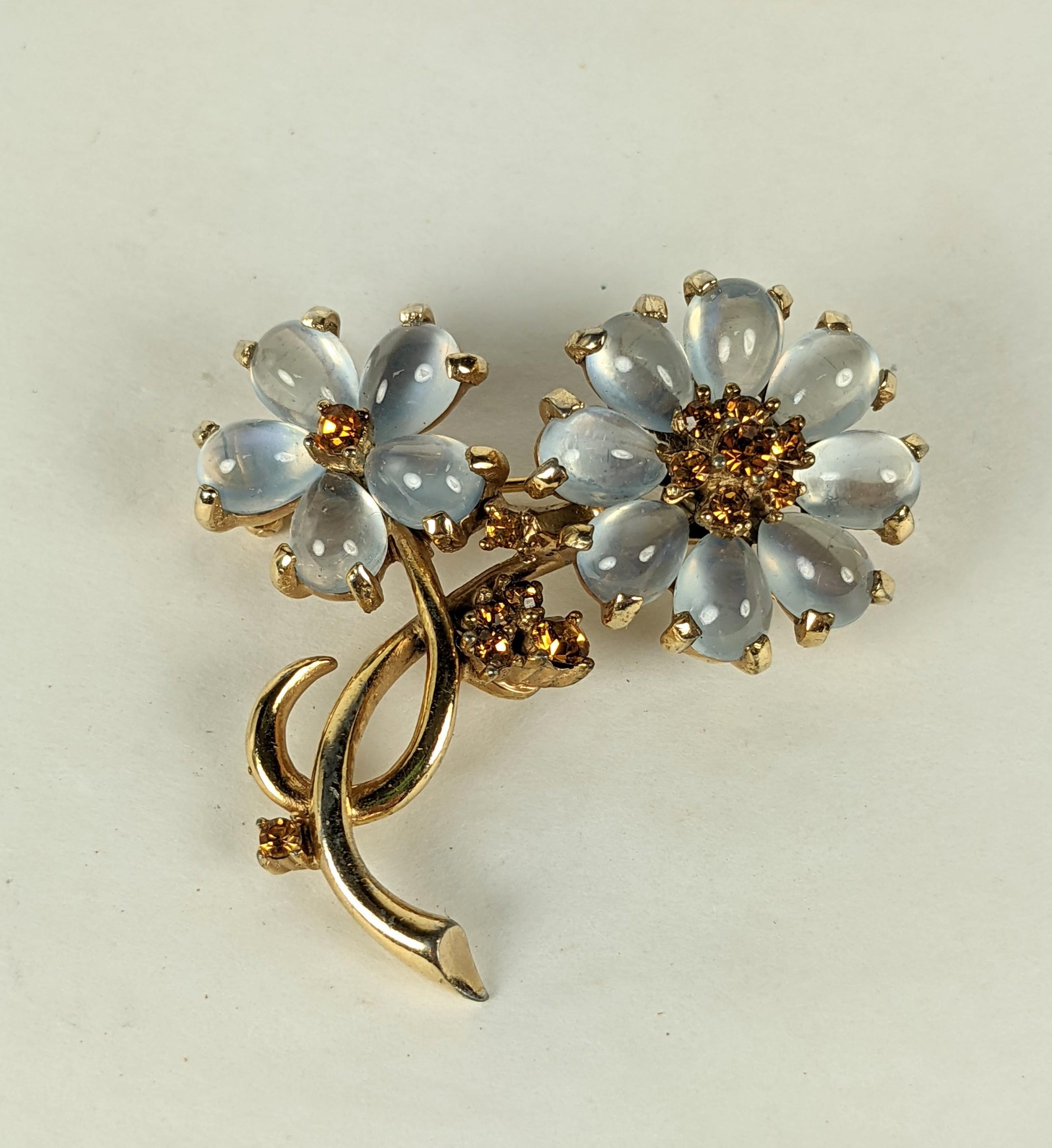 Charming Boucher Moonstone Citrine Paste Flower from the 1960's. Faux moonstones and citirines are used in this flower spray designed to look like real jewelry. 
Signed Boucher 6778. 1960's USA. 