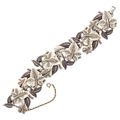 Boucher Pulsera de eslabones de hojas de hiedra chapada en plata y cristal blanco circa años 50