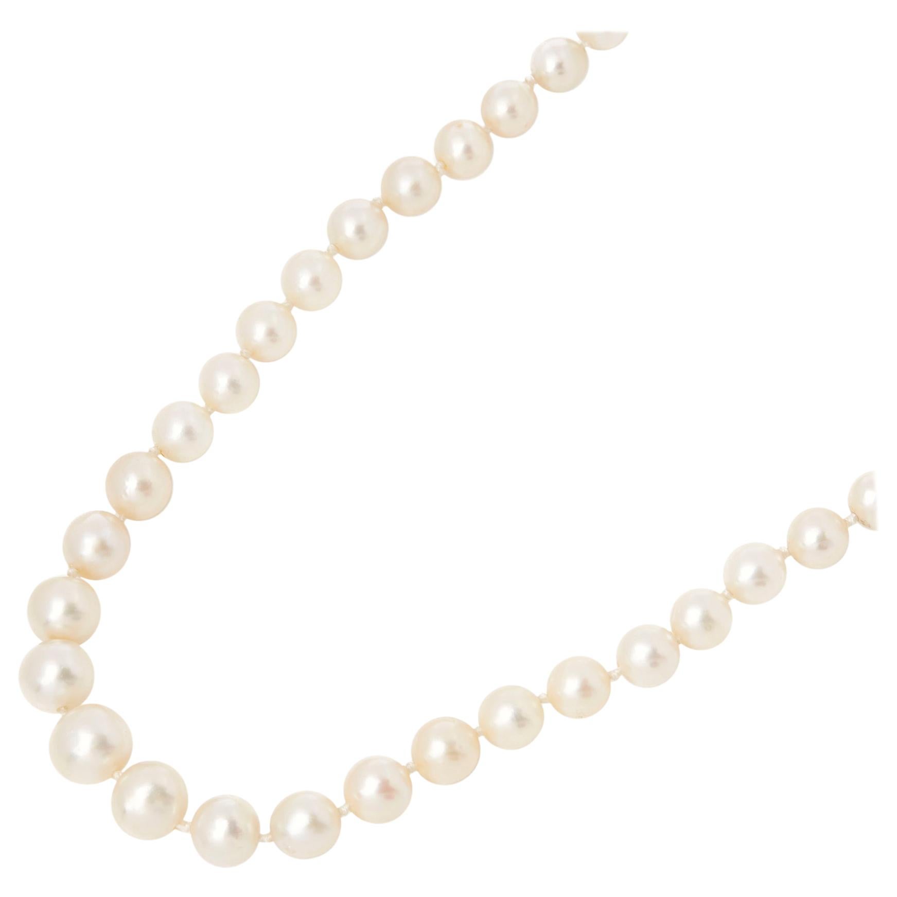 This Antique Necklace by Boucheron features Cultured Pearls and old cut Diamonds, with an 18k White Gold clasp. The Necklace has a secure push button clasp. Complete with Xupes Presentation Box.