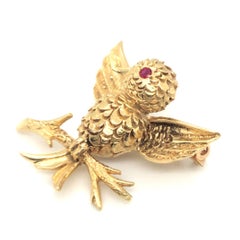 Boucheron 18 Karat Yellow Gold and Ruby Bird Brooch Pin, 1960s