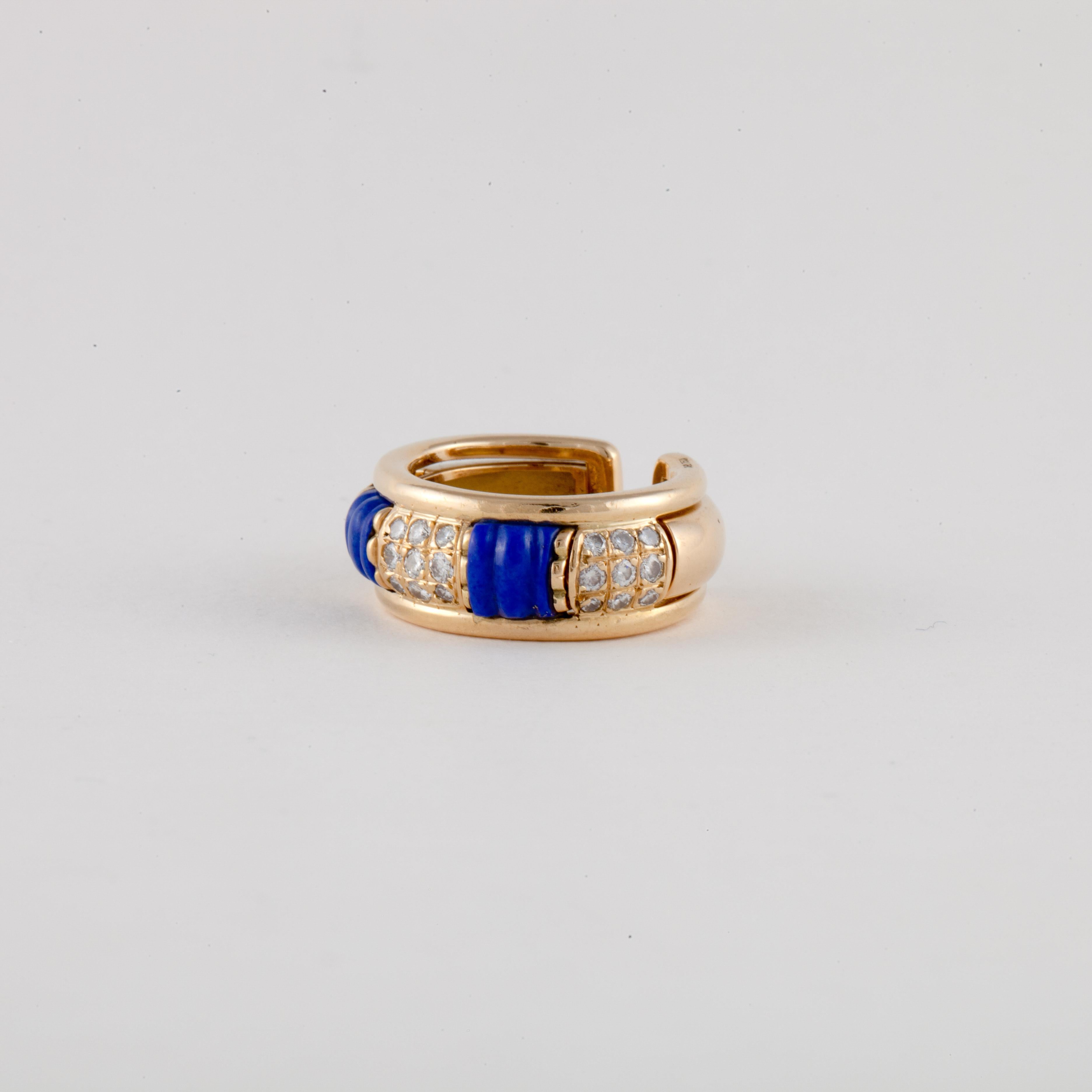 Boucheron ring is 18K yellow gold with carved lapis and diamond accents.  The ring is marked 