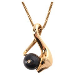 Collana Boucheron in oro 18k, giada e diamanti a forma di serpente