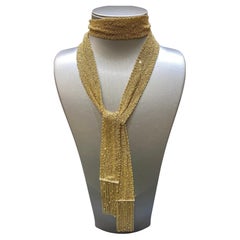 Boucheron 18k gold scarf necklace adorned with diamonds