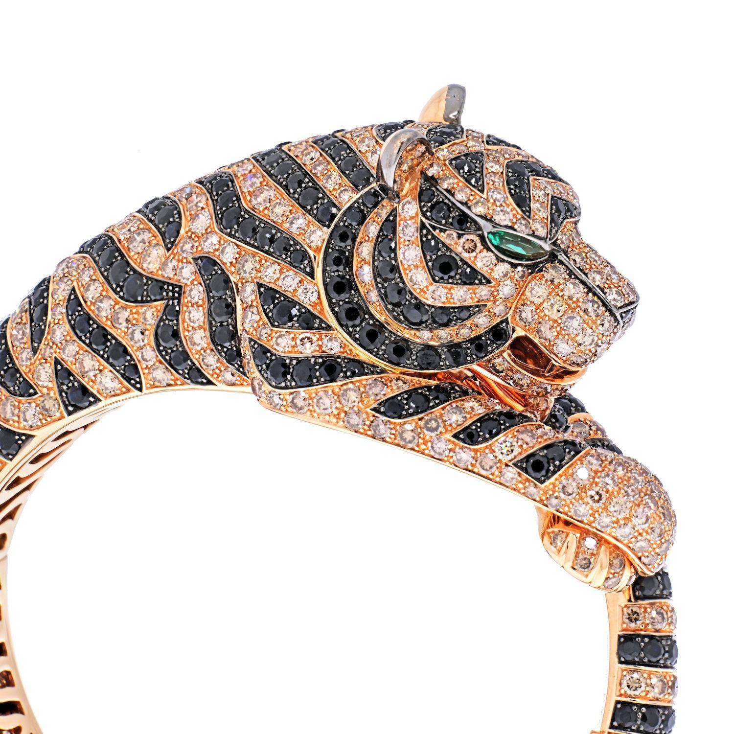 Fine jewelry fans already know that Boucheron likes to work with some unusual animal motifs, to produce majestic gemstone-encrusted swans, beguiling snakes, and sparkling chameleons.
Now Boucheron created this ferocious Bengal tiger with a pink gold