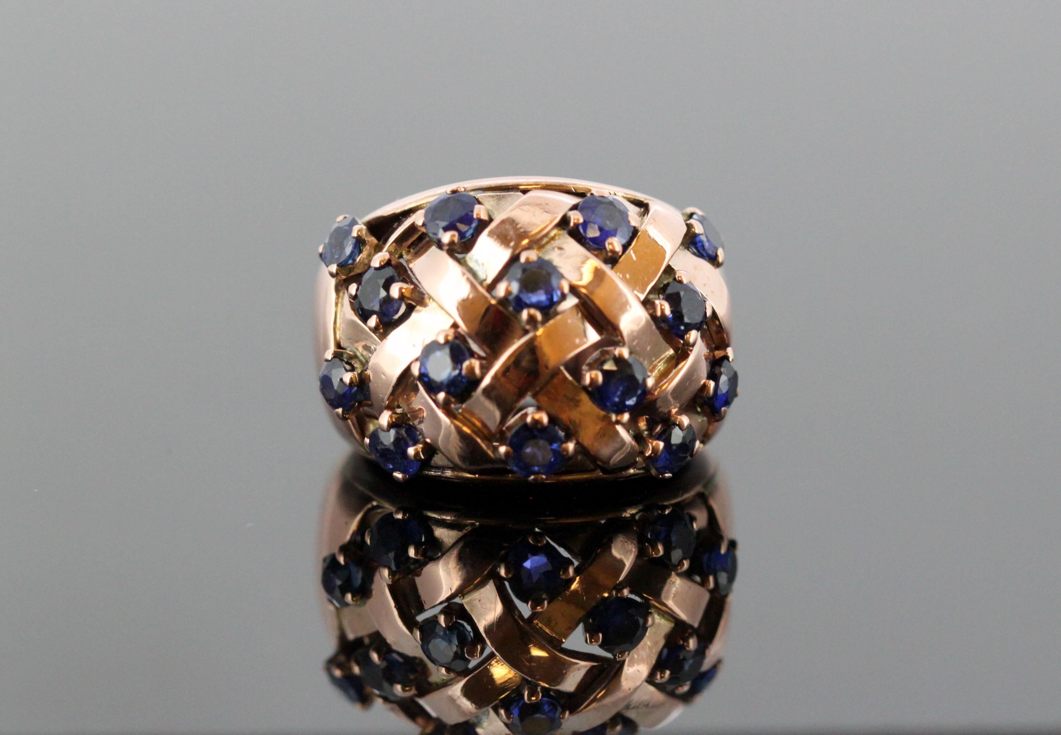 18k rose gold ladies ring with blue sapphires.
Designer: Boucheron
Made in London Circa 1970's
Fully hallmarked.

Dimension - 
Ring Size : 2.3 x 2.1 x 1.6 cm
Finger Size : (UK) = G (US) = 3 3/4  (EU) = 45 1/2
Weight : 9 grams

Blue Sapphire - 
Cut :