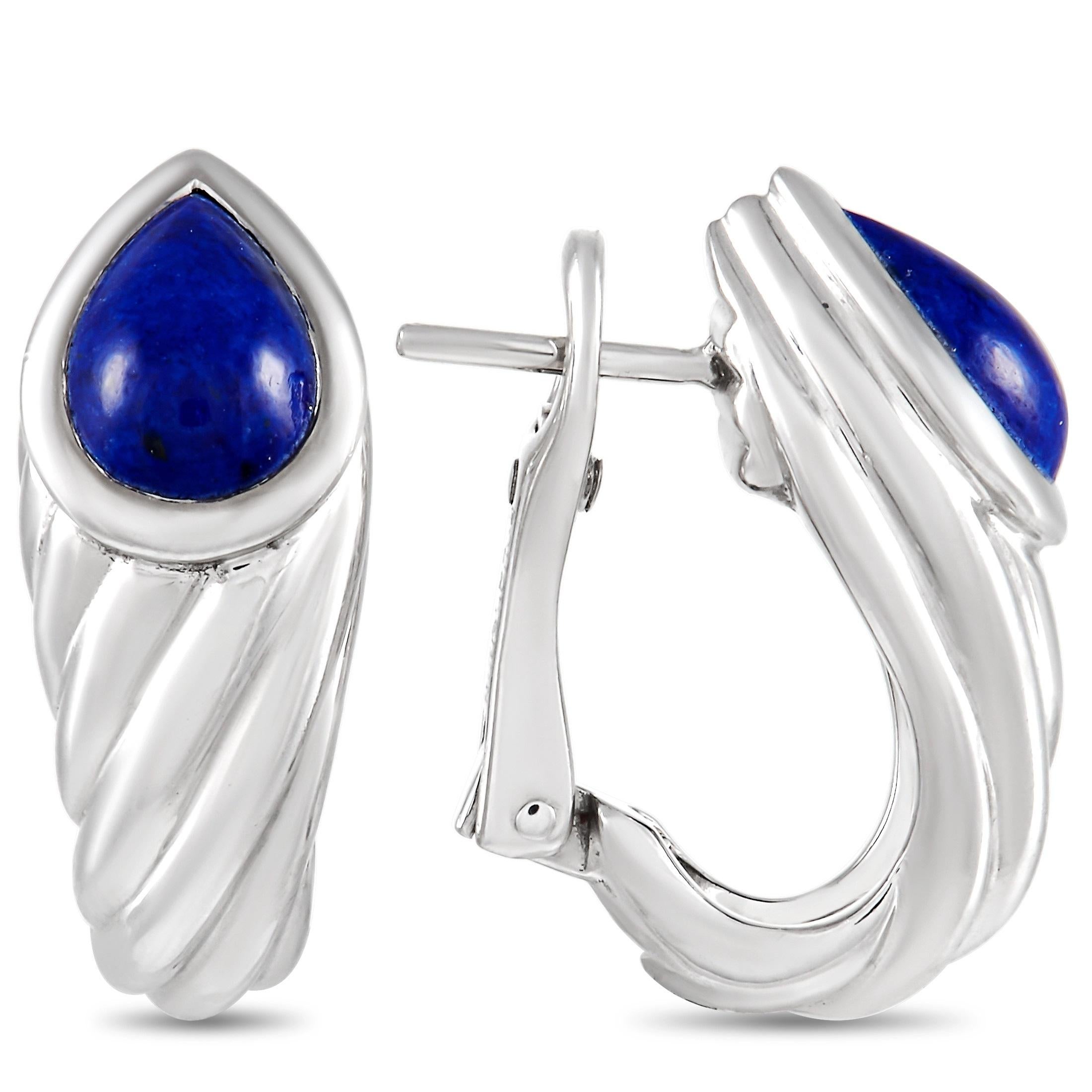 Designed by the first contemporary jeweler to open a boutique on Place Vendôme in Paris, this pair of lapis lazuli huggie earrings will be a treasured addition to your jewelry collection. The Boucheron 18K White Gold Lapis Lazuli Huggie Earrings