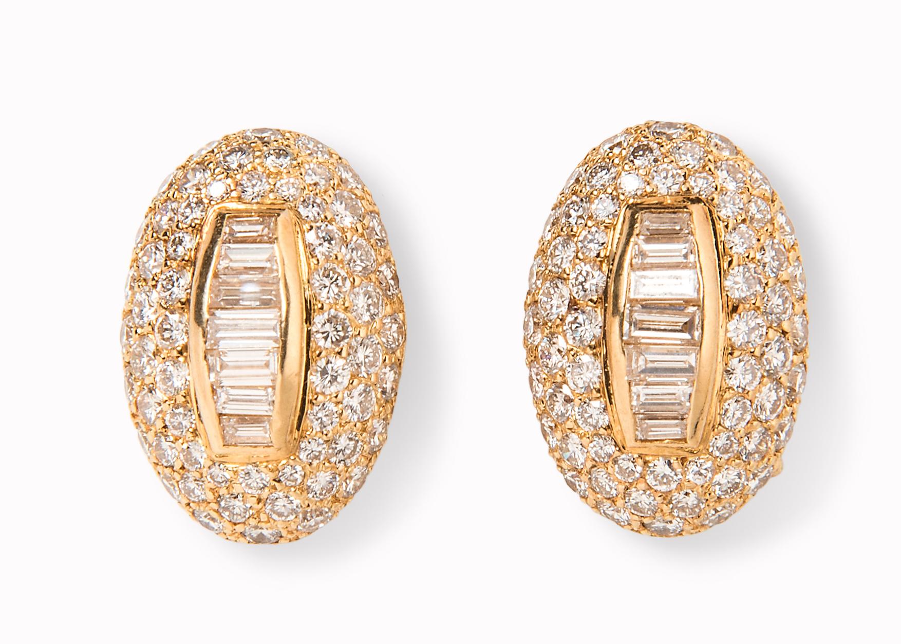 Bursting with late-70s glamour, Boucheron’s day and night diamond earrings are the essence of versatility for today’s busy world. An elegant oval bombe form is set with round and baguette diamonds and suspends a detachable pendant further set with
