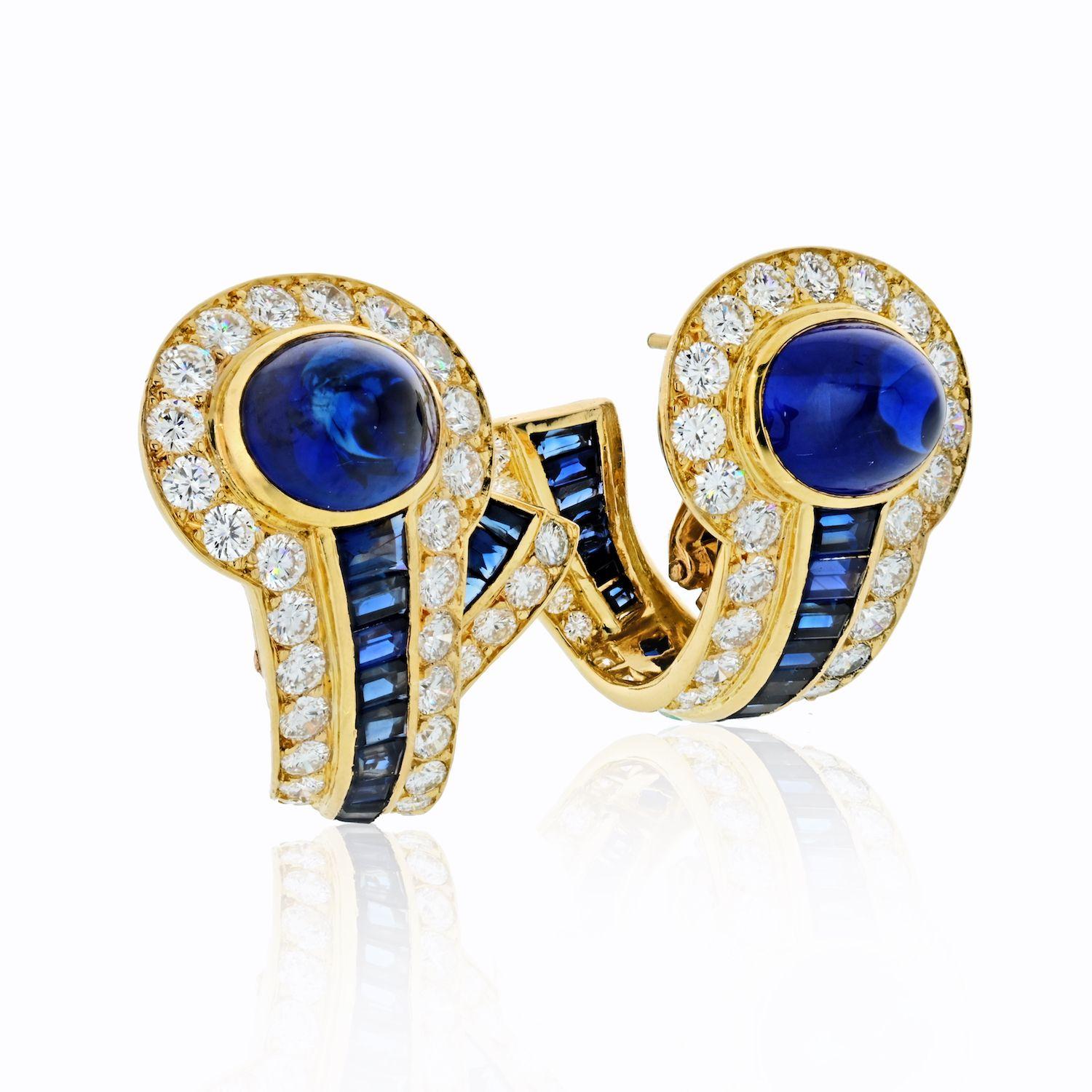 A pair of blue sapphire and diamond earrings mounted in yellow gold made by Boucheron.
These stylish earrings from the 70s are set with round-cut diamonds (F-G/VVS) and blue cabochon and baguette sapphires.
Finished with post backings for pierced