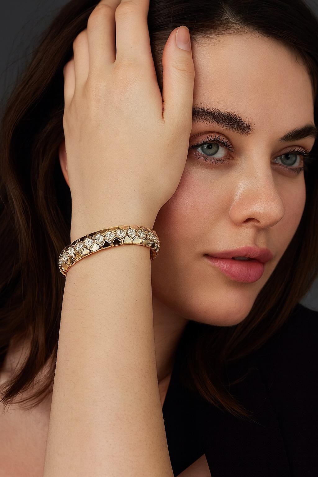 Boucheron 18K Yellow Gold Diamond Bracelet

An impressive vintage bracelet by Boucheron, finely crafted in 18K yellow gold and richly set with brilliant round diamonds. The bold yet elegant design reflects the timeless craftsmanship of the French