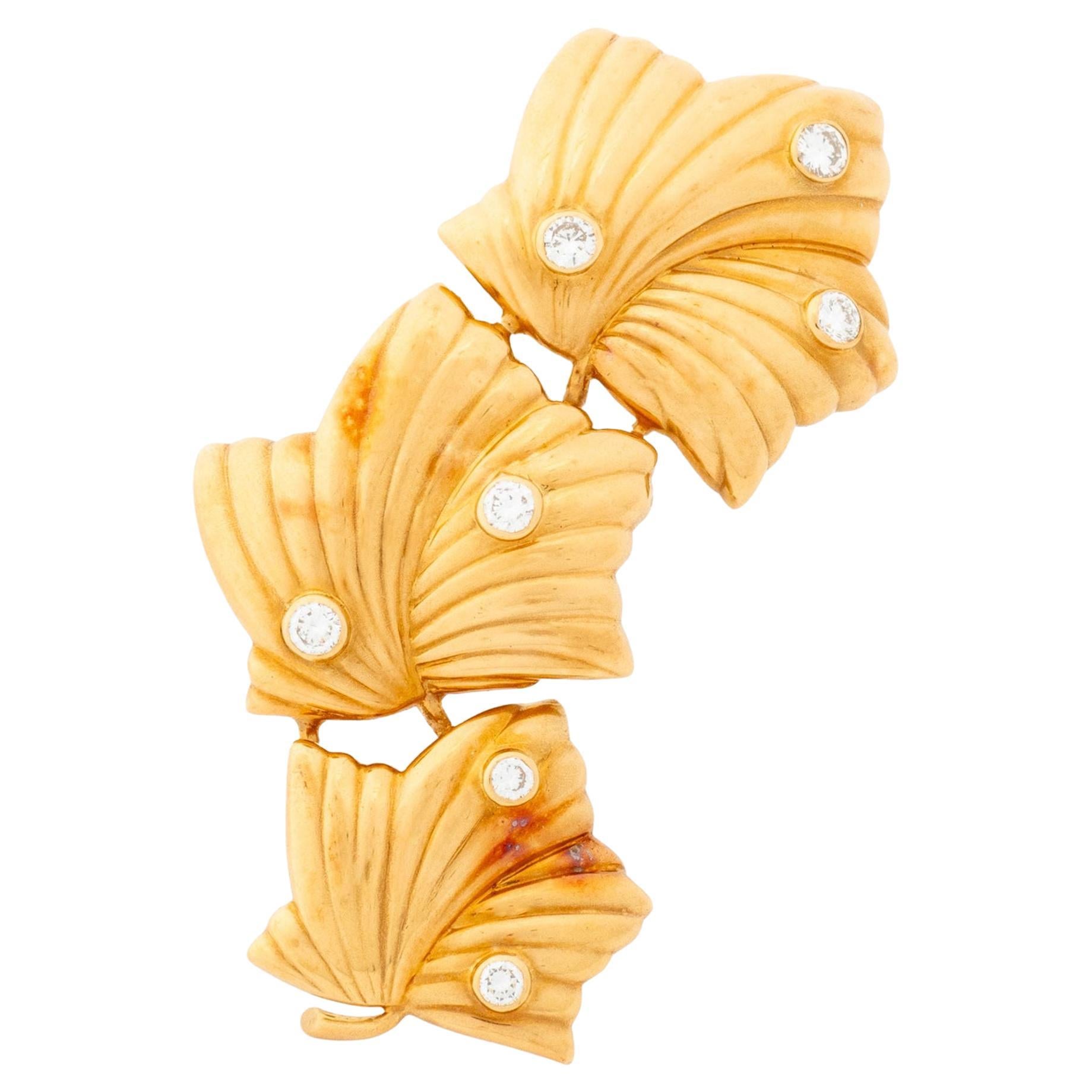 Boucheron Broche en or jaune 18K avec diamants en vente