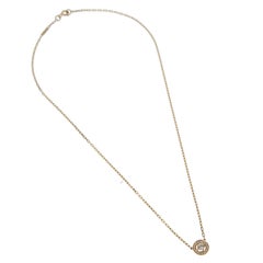 Boucheron Collier pendentif solitaire en or jaune 18k avec diamants