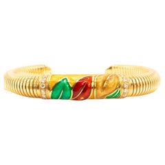 Boucheron, manchette vintage en or jaune 18 carats, émail et diamants