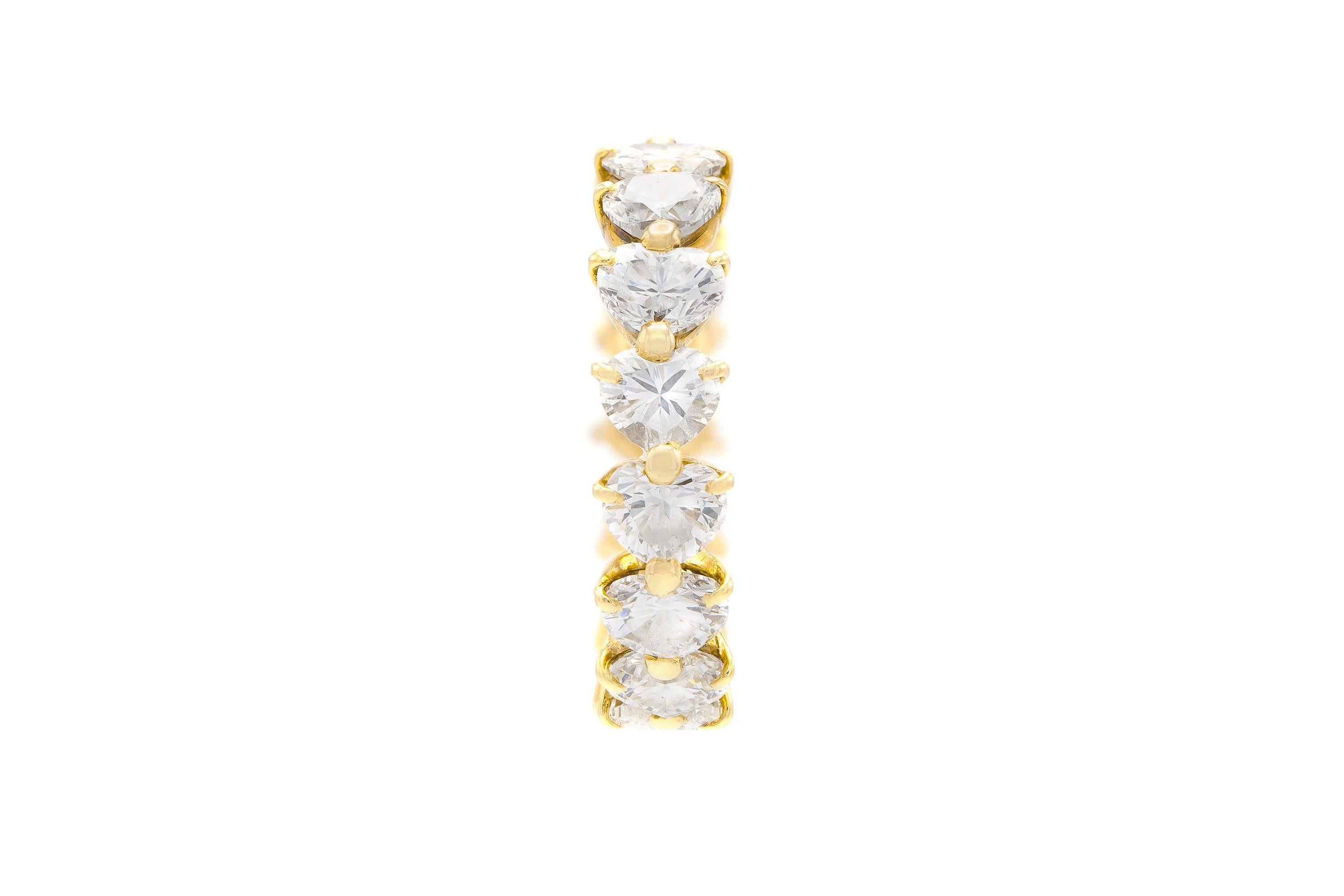 Finely crafted in 18k yellow gold with 15 heart cut diamonds weighing a total of approximately 5.50 carats.
Signed by Boucheron
Circa 1980s
