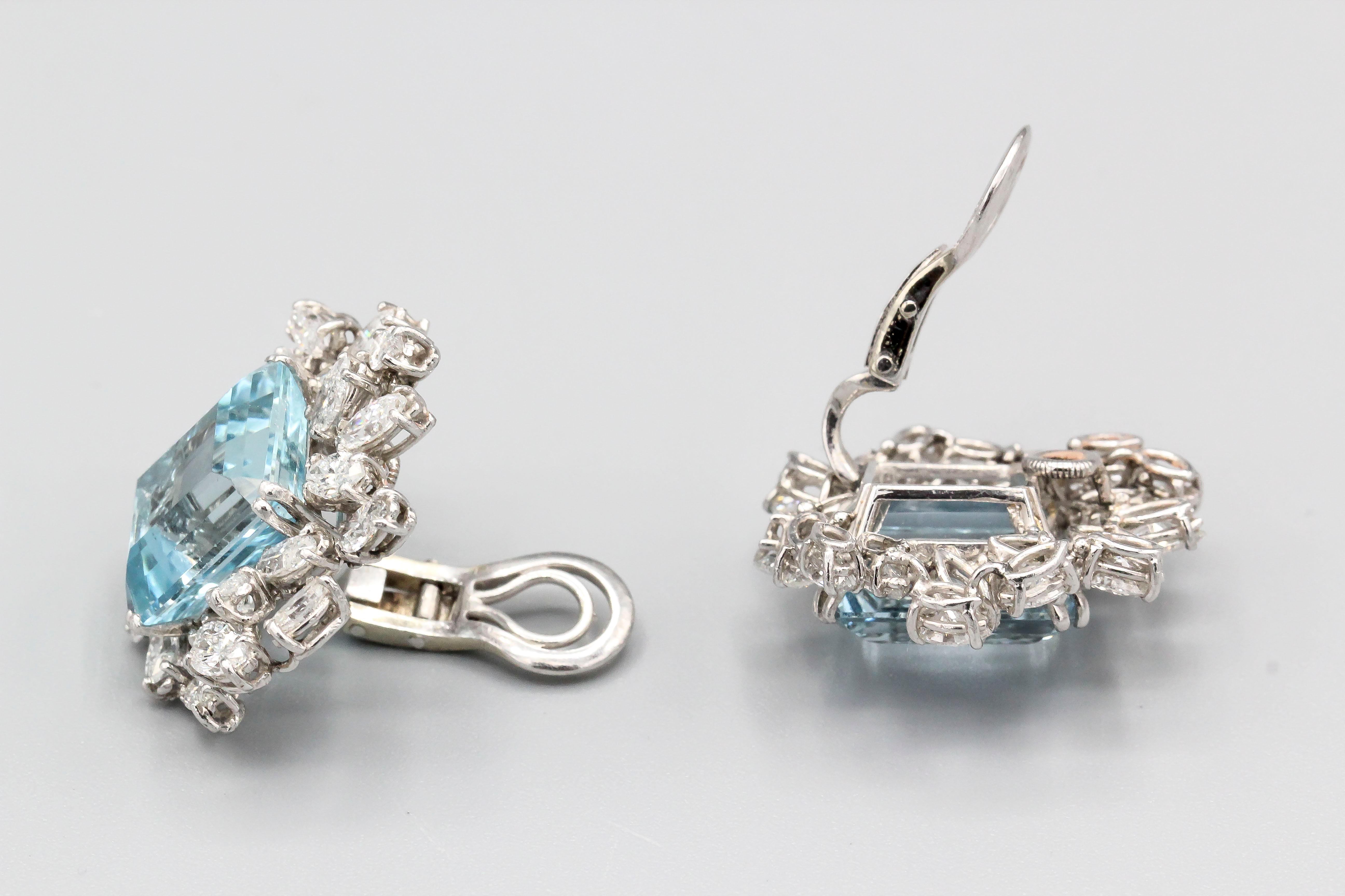 Very fine pair of aquamarine and diamond earrings set in platinum, by Boucheron, circa 1960s-70s.  The earrings feature two fine large aquamarine of approx. 20 carats total weight, further adorned with approx. 7 carats of high grade white marquise