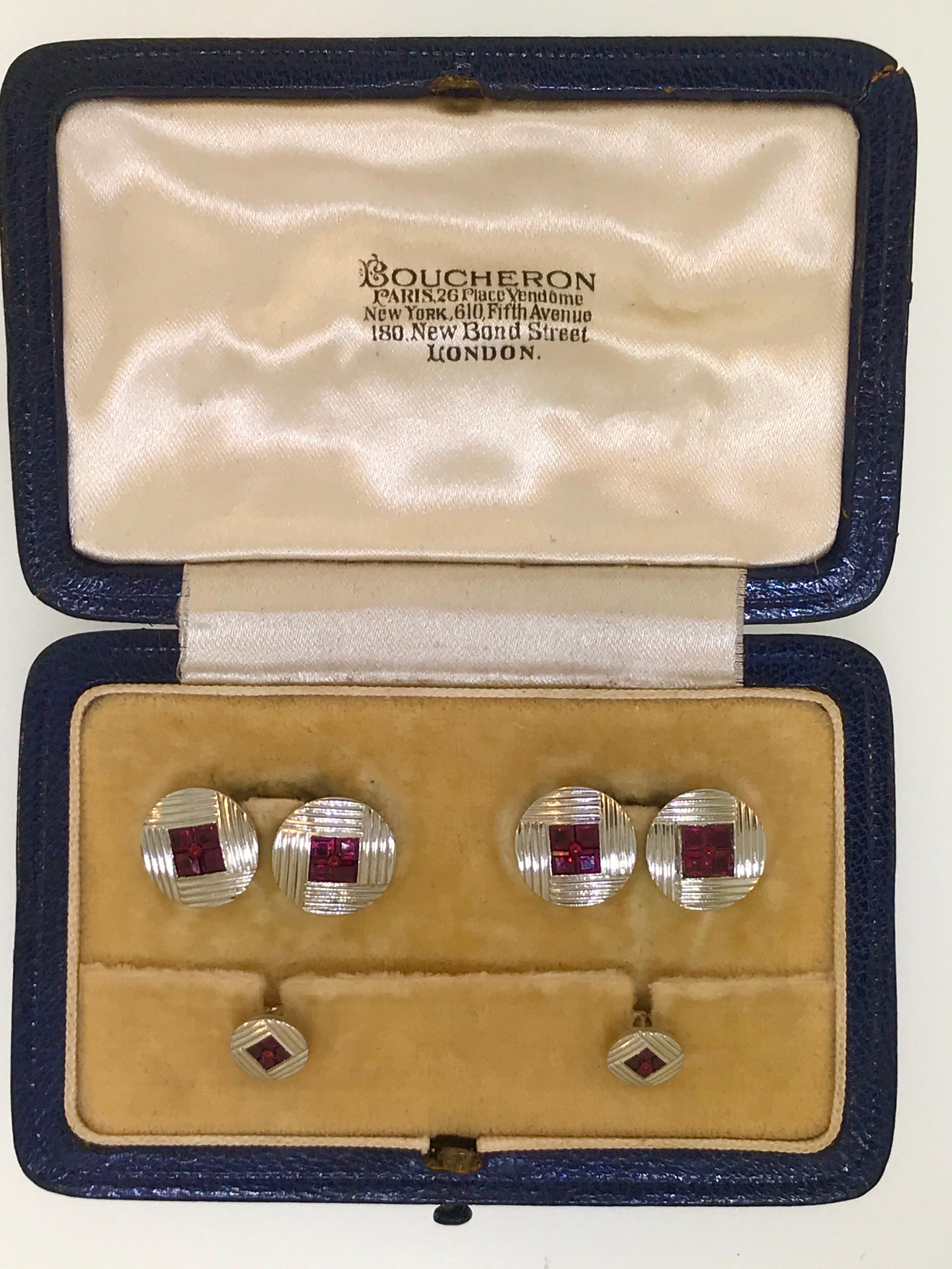 Beautiful Boucheron of Paris Platinum Ruby Cufflink and Collar Pin Set. Circa 1930.  Pure Art Deco style!  With original Box!  1 Carat of good quality French cut Rubies.  Classic Double sided cufflinks.

From an estate in London.

Vintage Art Deco
