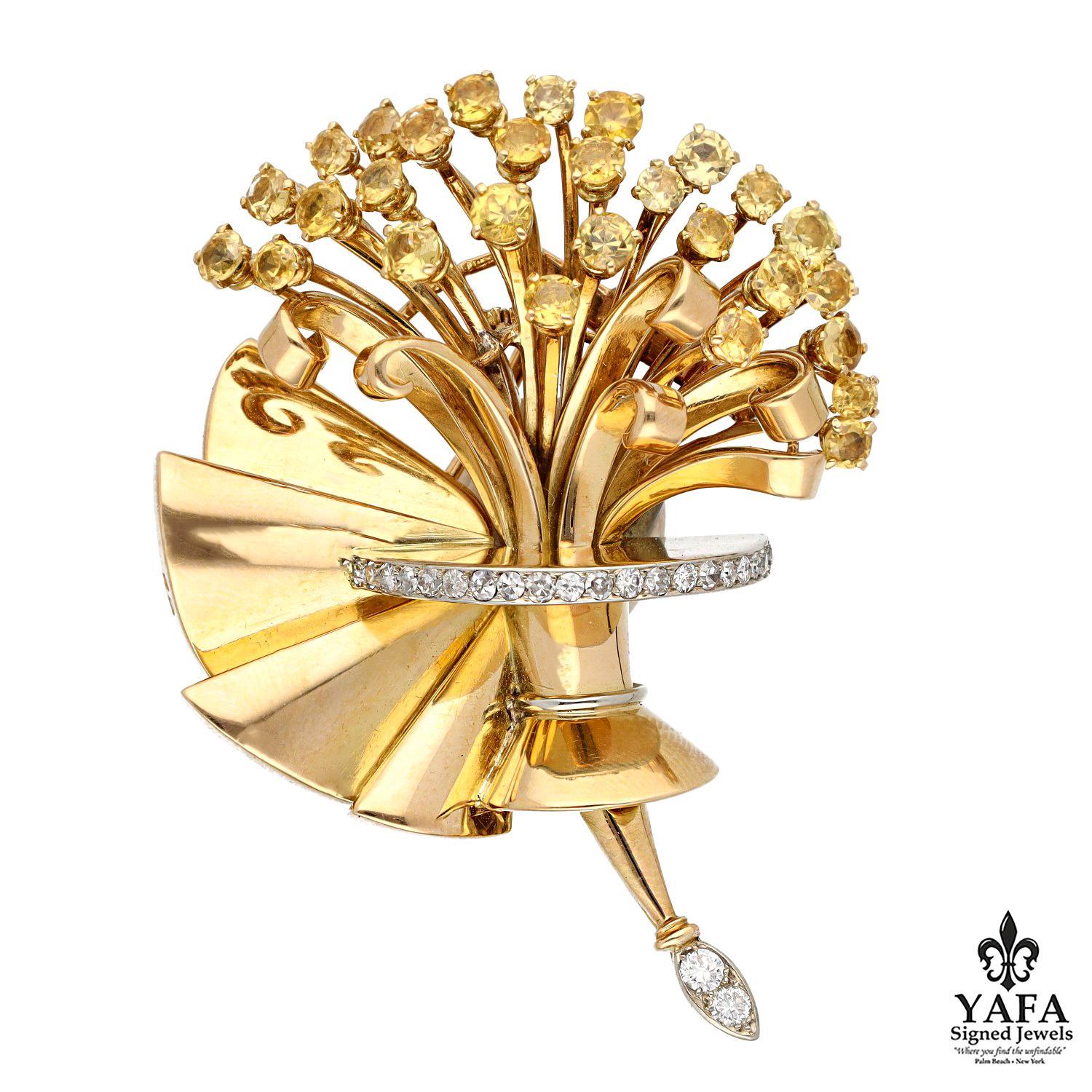 Conceived as a Ceremonial Bouquet of Resplendent Yellow Roses Tied with a Sash of Gold Satin. 
The Collective Effect is Created From 18K Yellow Gold, Yellow Sapphires of Vibrant Hues, and Round Brilliant-Cut Diamonds.
Approximate Length -